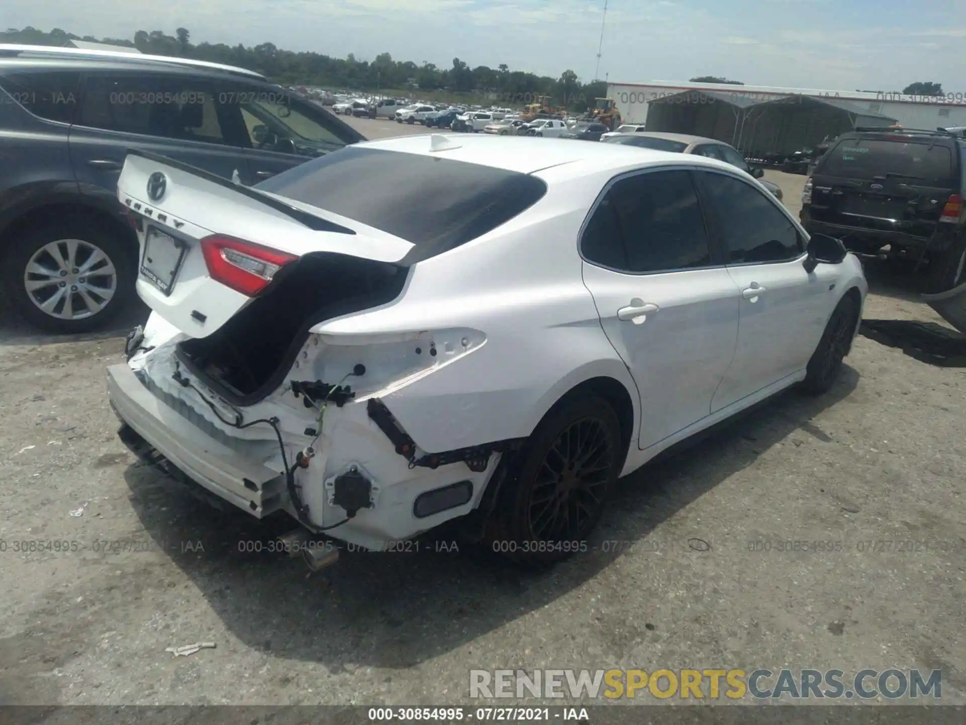 4 Photograph of a damaged car 4T1B11HK4KU807274 TOYOTA CAMRY 2019