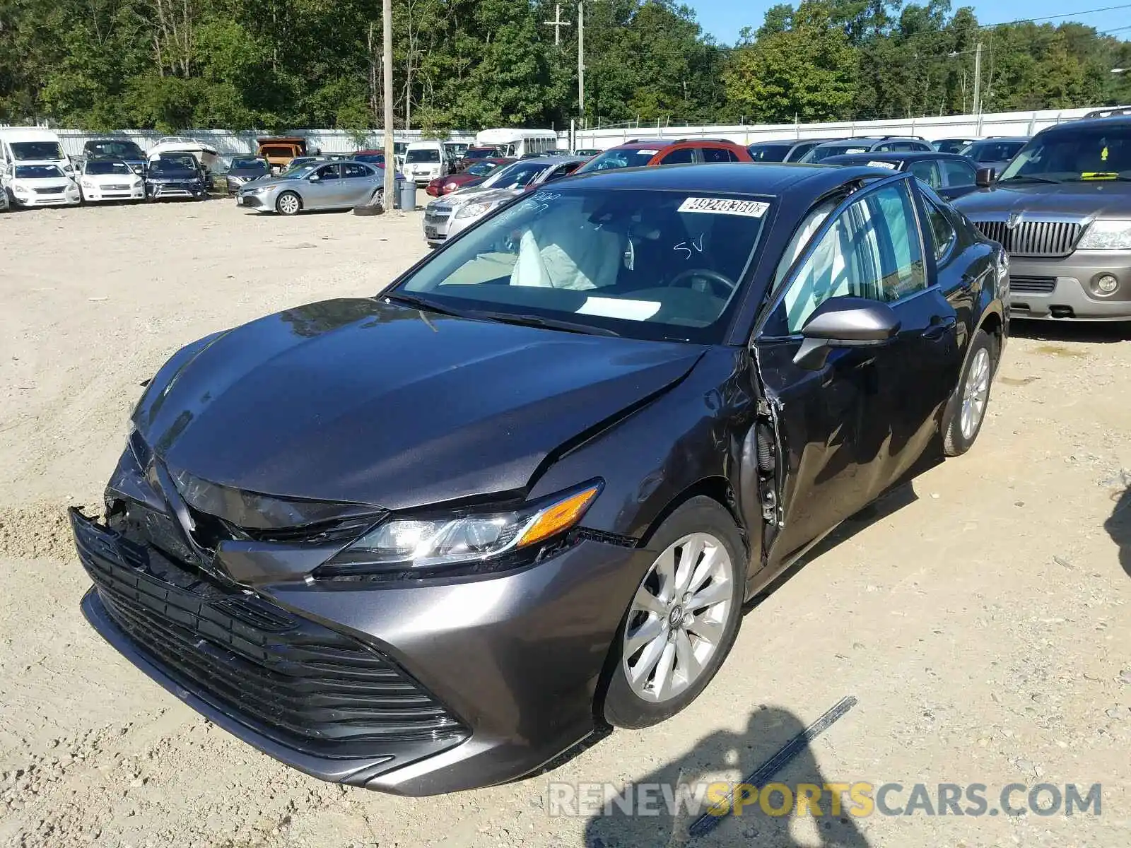 2 Photograph of a damaged car 4T1B11HK4KU808568 TOYOTA CAMRY 2019