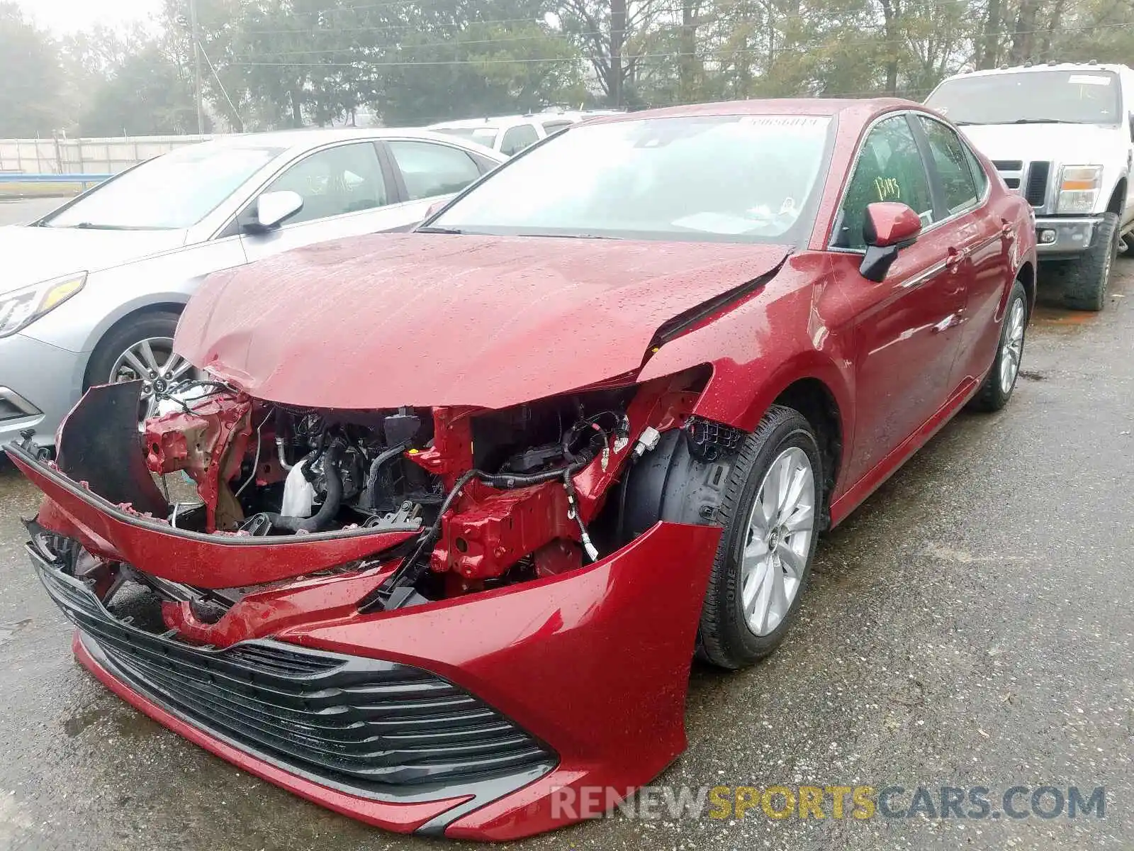 2 Photograph of a damaged car 4T1B11HK4KU810367 TOYOTA CAMRY 2019