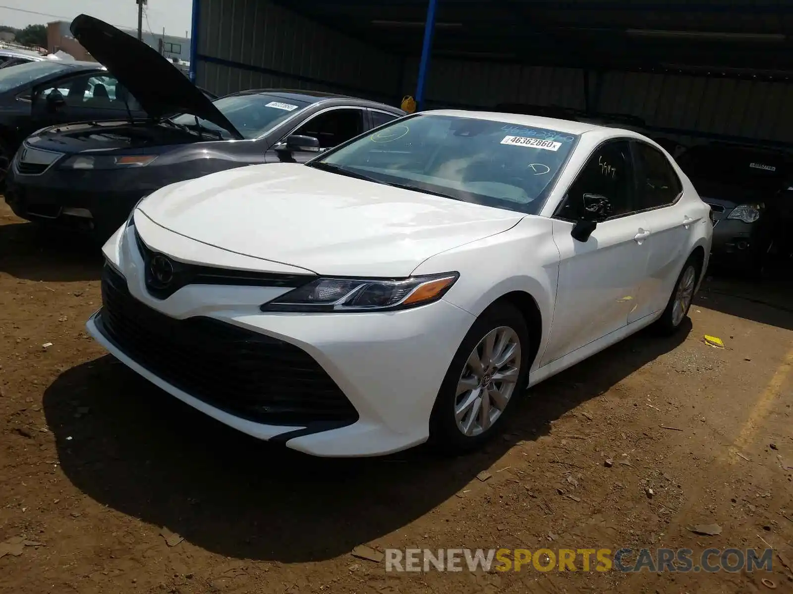 2 Photograph of a damaged car 4T1B11HK4KU812328 TOYOTA CAMRY 2019