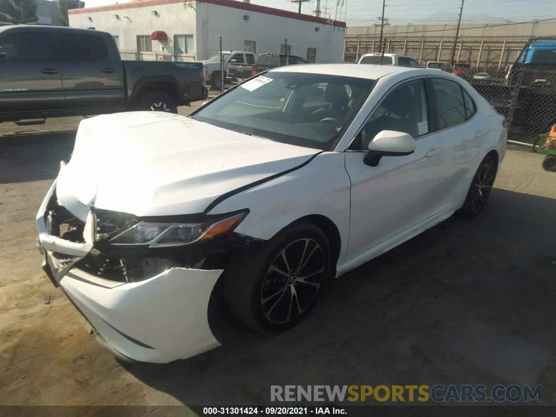 2 Photograph of a damaged car 4T1B11HK4KU812426 TOYOTA CAMRY 2019