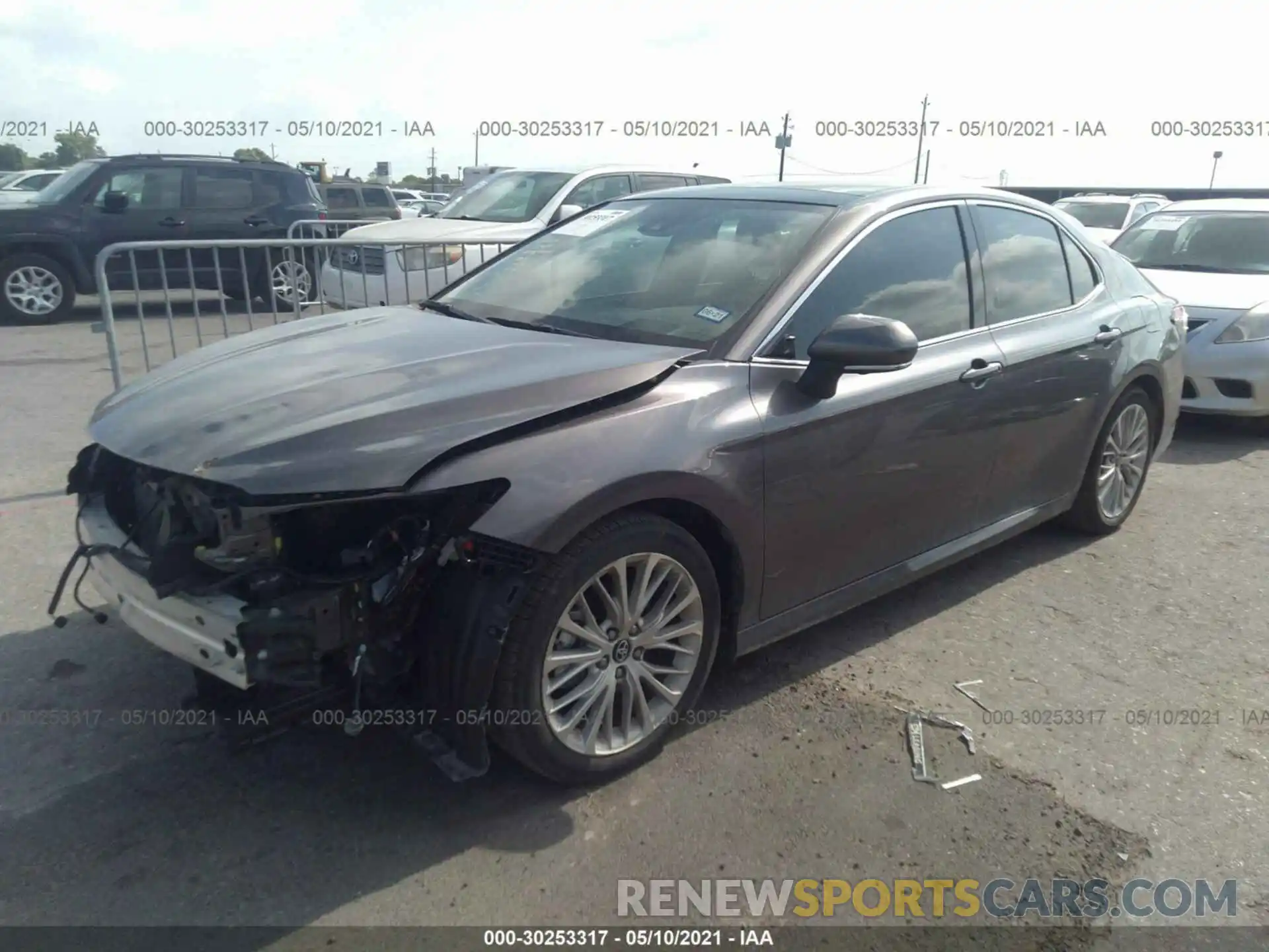 2 Photograph of a damaged car 4T1B11HK4KU812734 TOYOTA CAMRY 2019