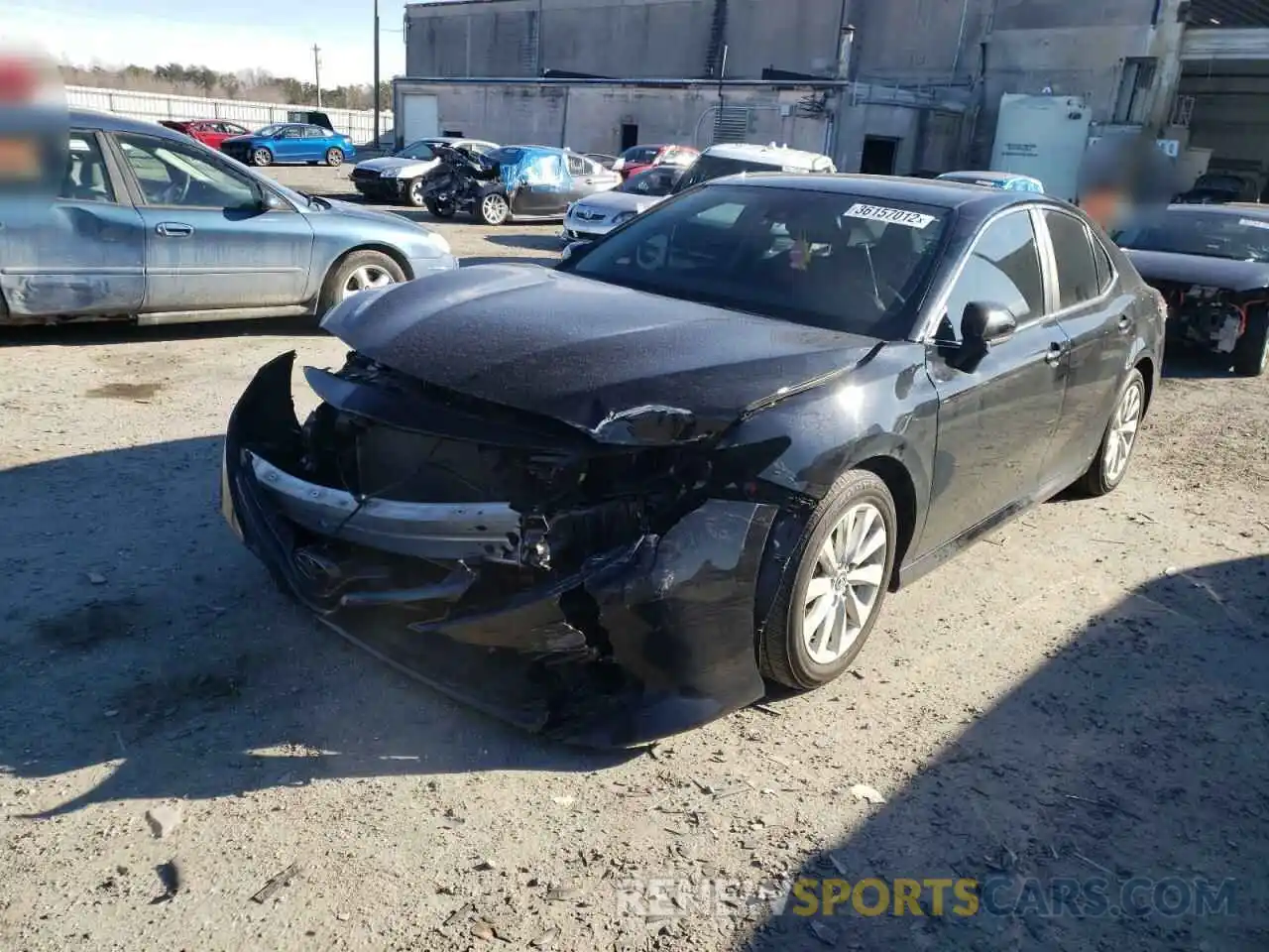 2 Photograph of a damaged car 4T1B11HK4KU812748 TOYOTA CAMRY 2019