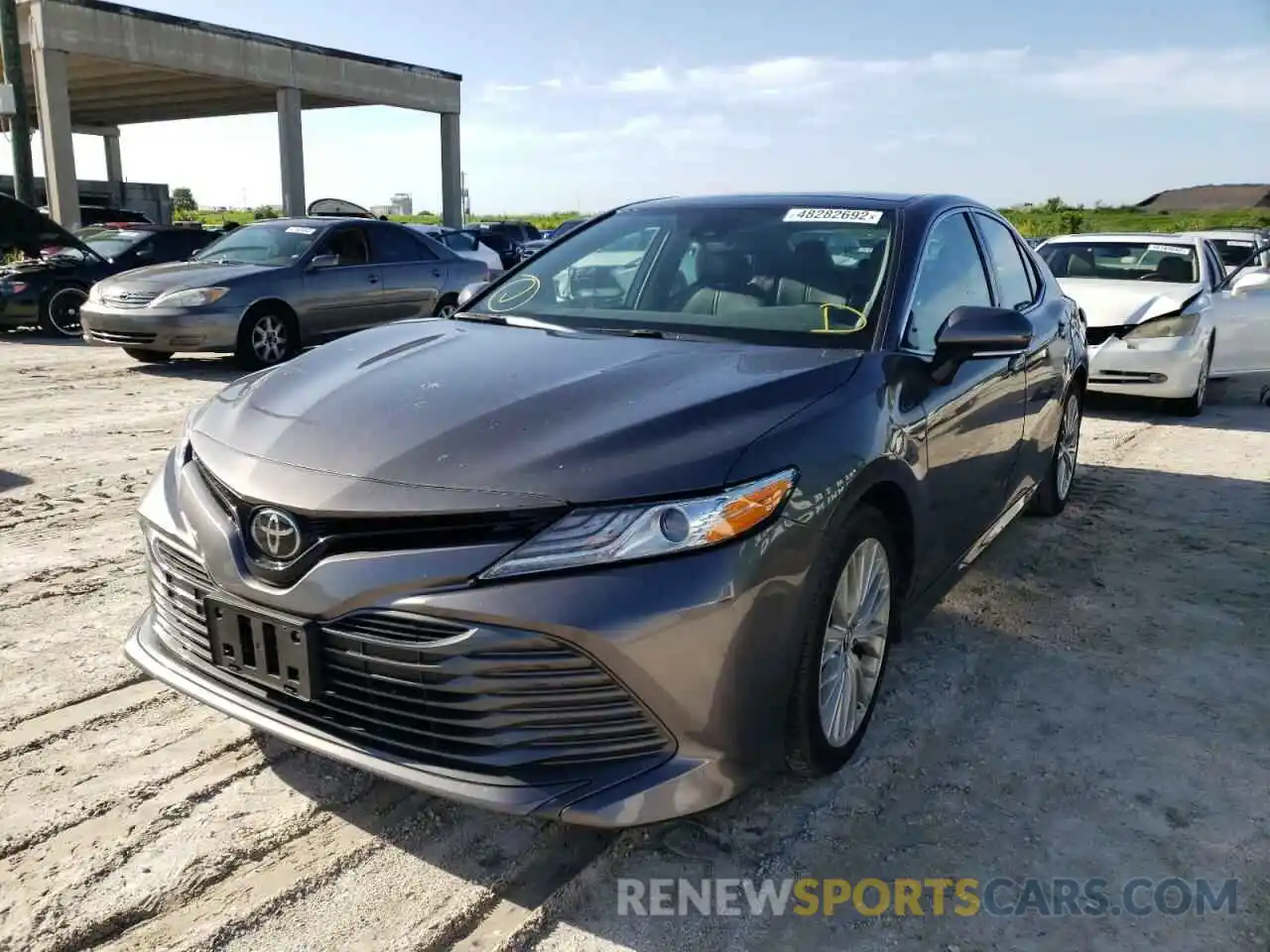 2 Photograph of a damaged car 4T1B11HK4KU812815 TOYOTA CAMRY 2019