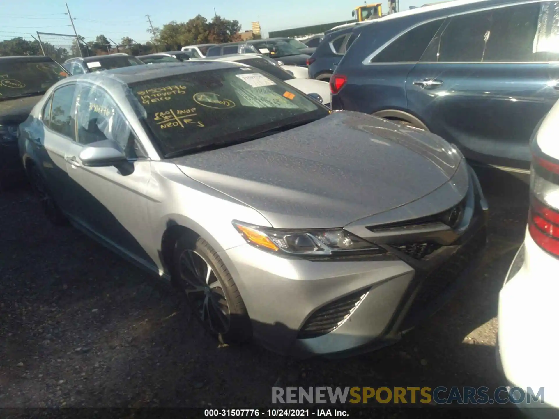 1 Photograph of a damaged car 4T1B11HK4KU813818 TOYOTA CAMRY 2019