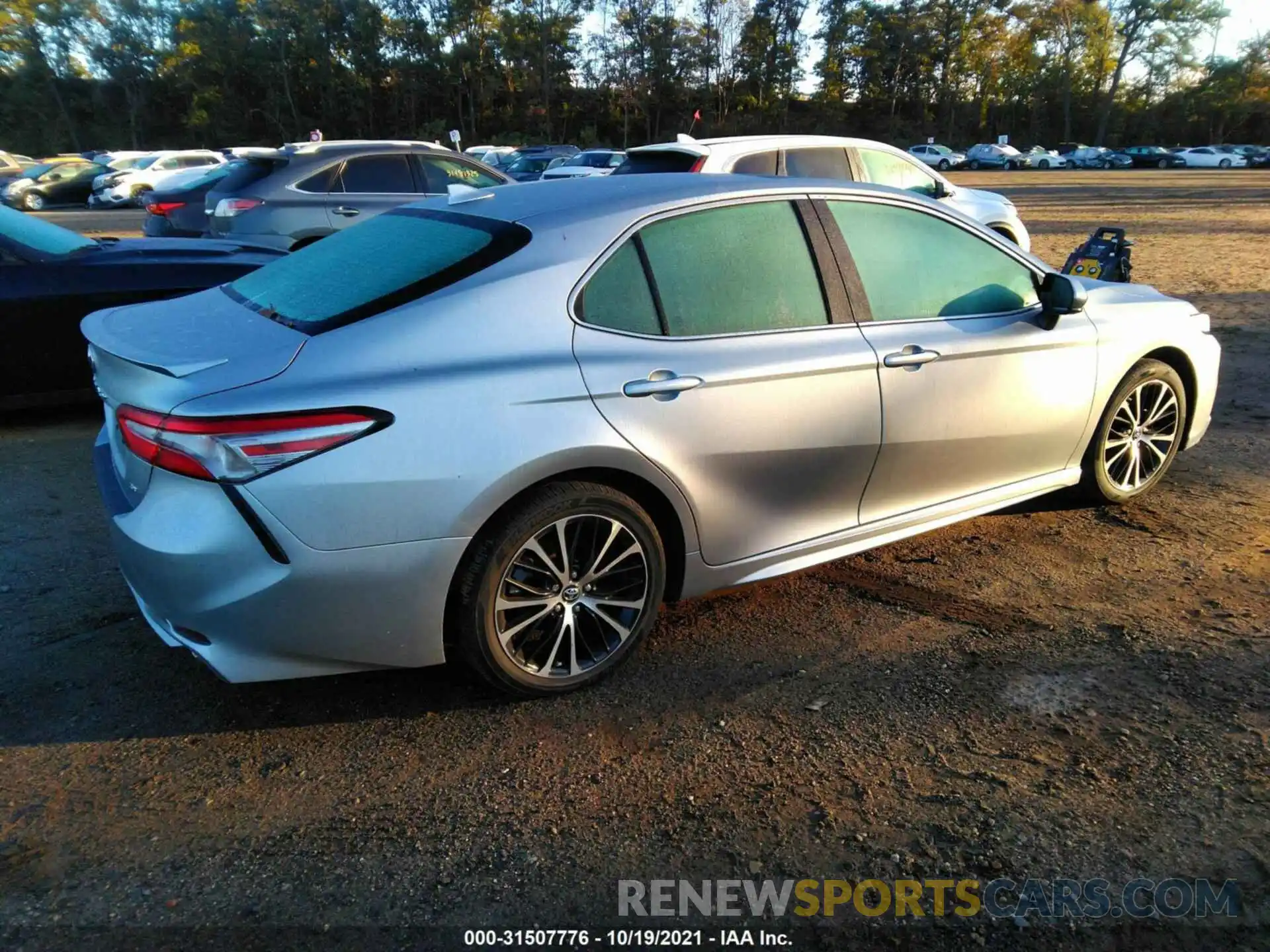 4 Photograph of a damaged car 4T1B11HK4KU813818 TOYOTA CAMRY 2019