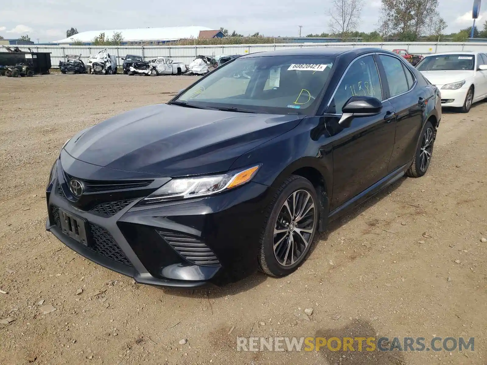 2 Photograph of a damaged car 4T1B11HK4KU814595 TOYOTA CAMRY 2019