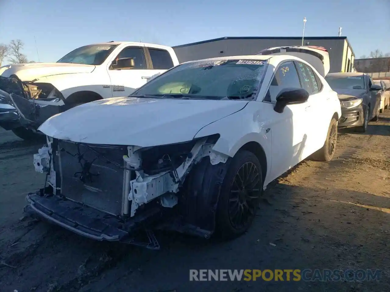 2 Photograph of a damaged car 4T1B11HK4KU817772 TOYOTA CAMRY 2019