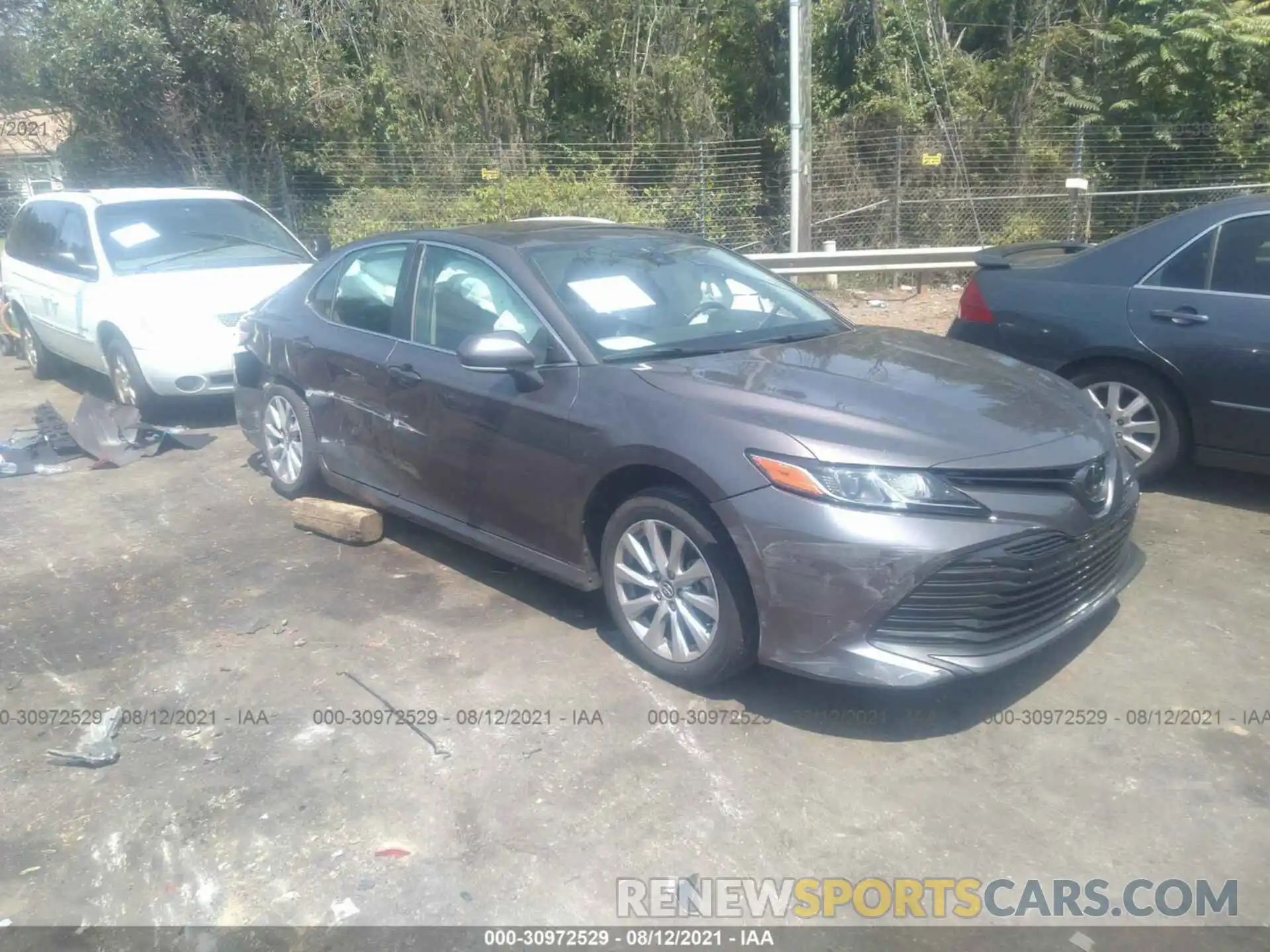 1 Photograph of a damaged car 4T1B11HK4KU817965 TOYOTA CAMRY 2019