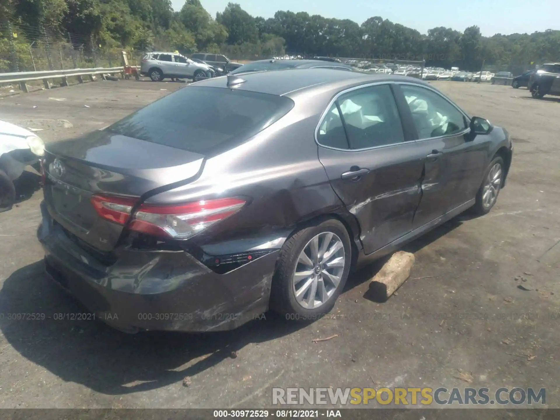 4 Photograph of a damaged car 4T1B11HK4KU817965 TOYOTA CAMRY 2019