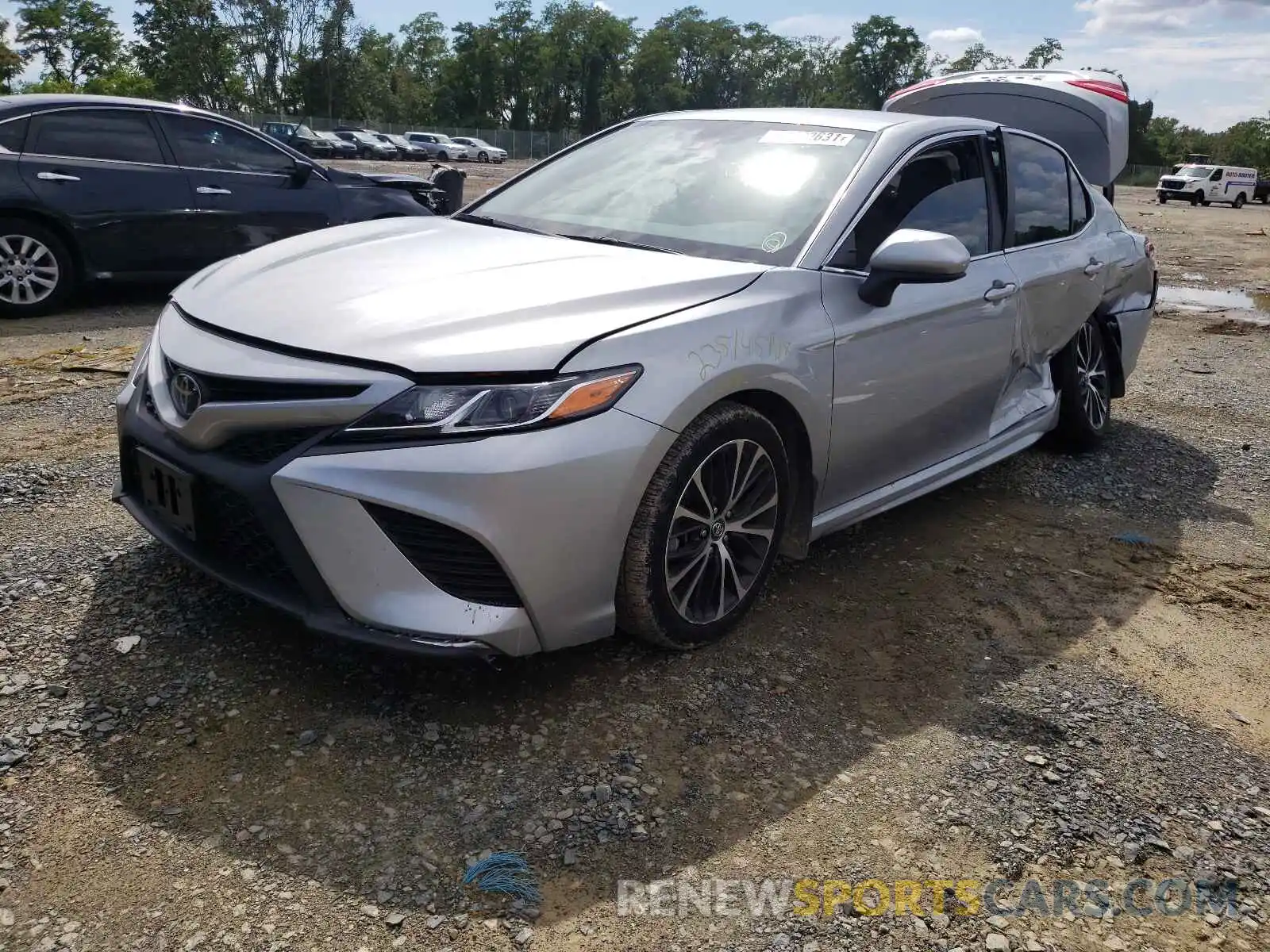 2 Photograph of a damaged car 4T1B11HK4KU820459 TOYOTA CAMRY 2019