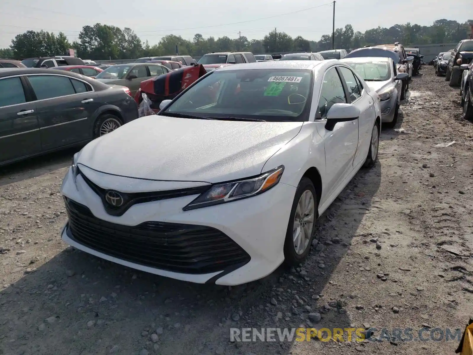 2 Photograph of a damaged car 4T1B11HK4KU822292 TOYOTA CAMRY 2019