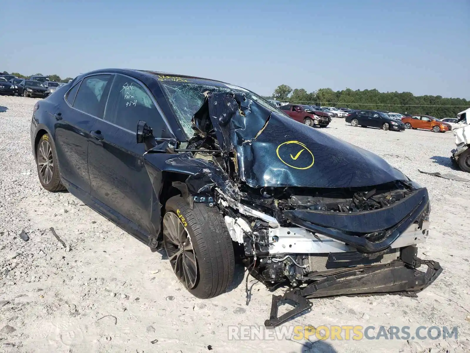 1 Photograph of a damaged car 4T1B11HK4KU823135 TOYOTA CAMRY 2019