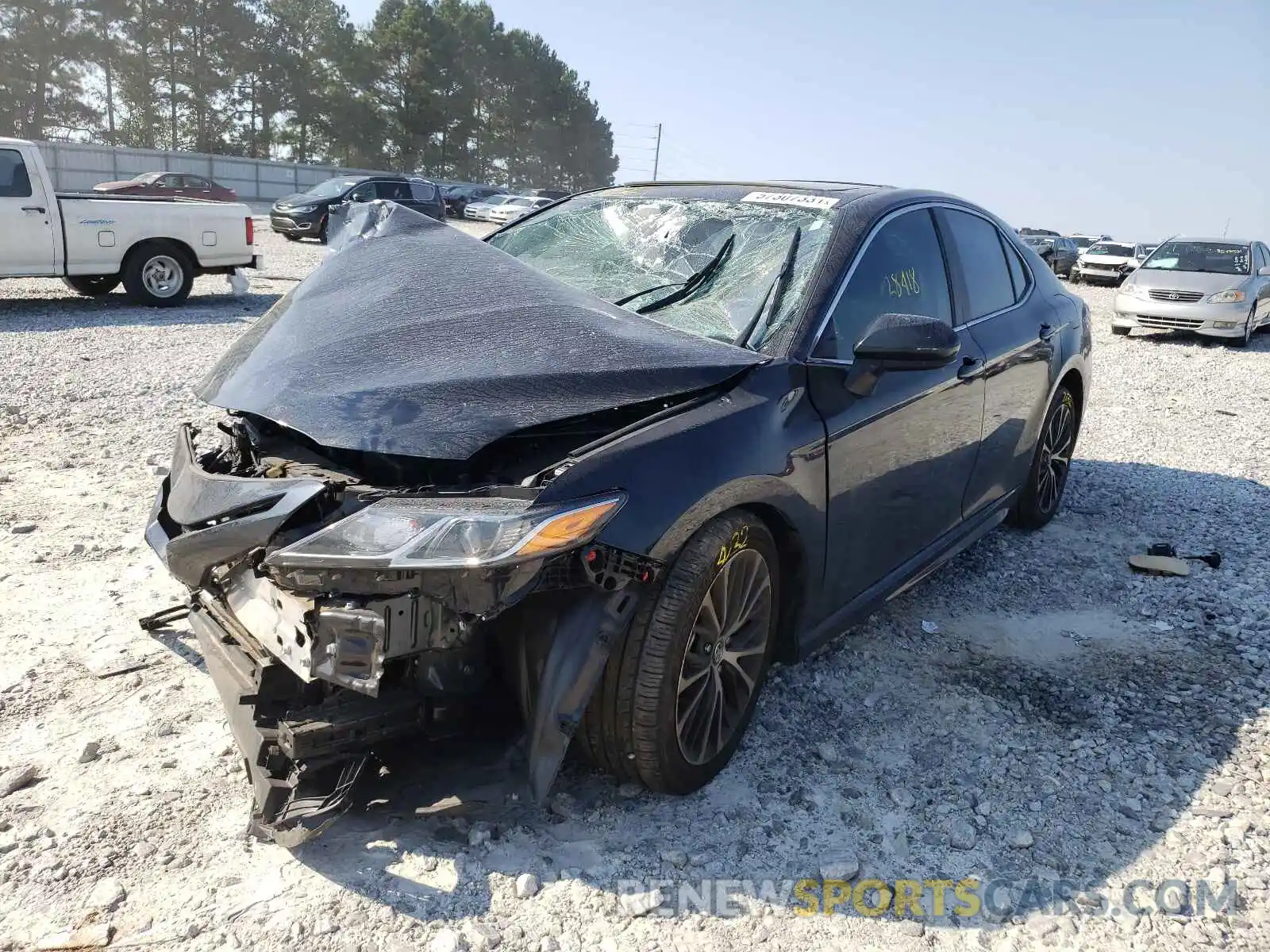 2 Photograph of a damaged car 4T1B11HK4KU823135 TOYOTA CAMRY 2019