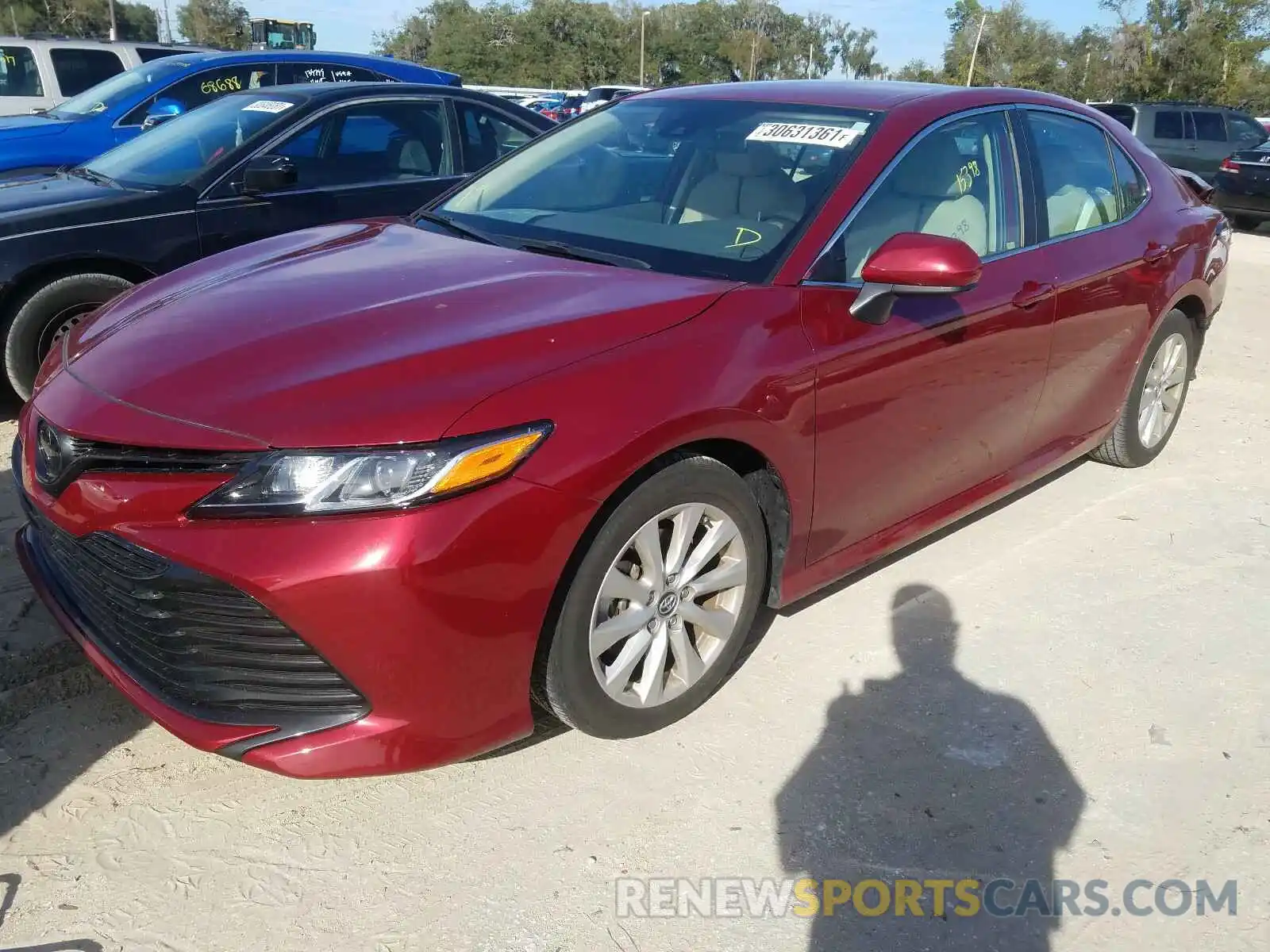 2 Photograph of a damaged car 4T1B11HK4KU824639 TOYOTA CAMRY 2019