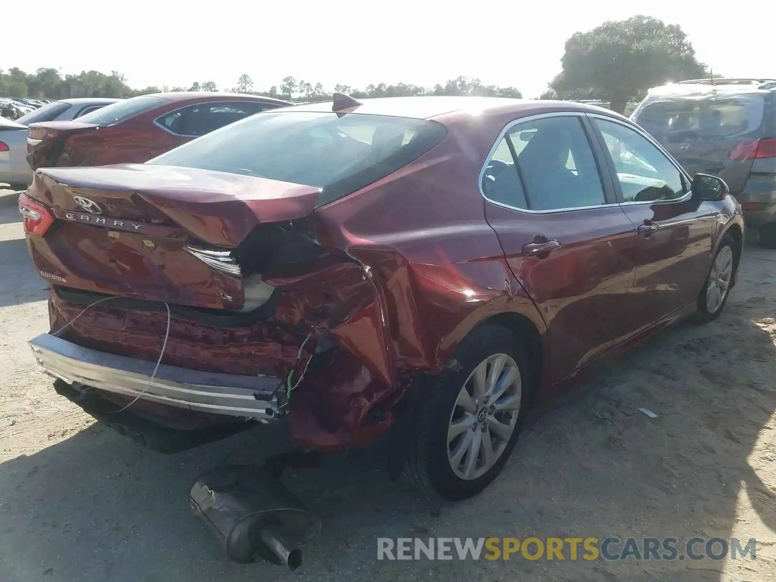 4 Photograph of a damaged car 4T1B11HK4KU824639 TOYOTA CAMRY 2019