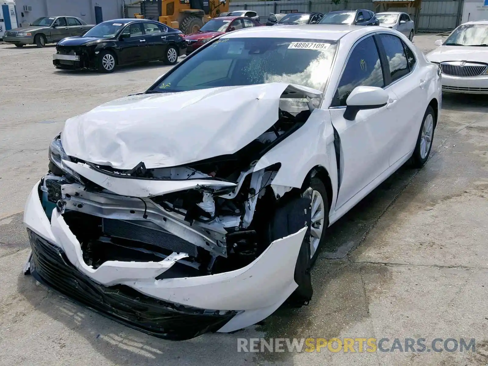 2 Photograph of a damaged car 4T1B11HK4KU824799 TOYOTA CAMRY 2019