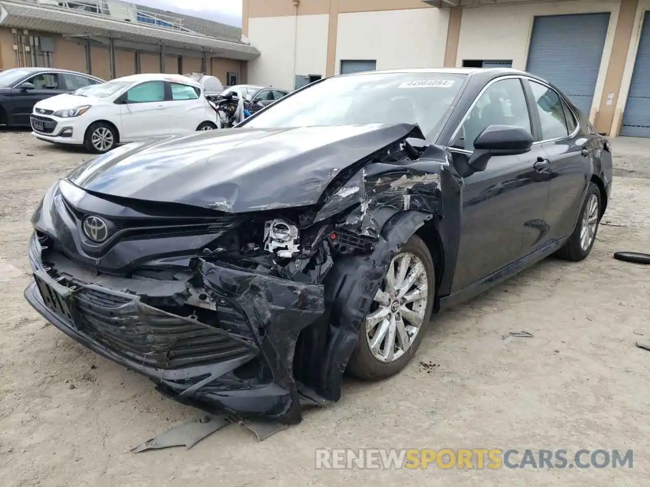 1 Photograph of a damaged car 4T1B11HK4KU825449 TOYOTA CAMRY 2019