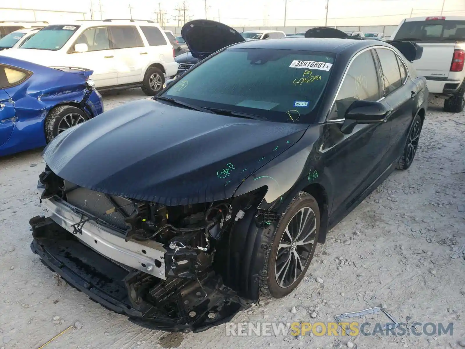 2 Photograph of a damaged car 4T1B11HK4KU828299 TOYOTA CAMRY 2019