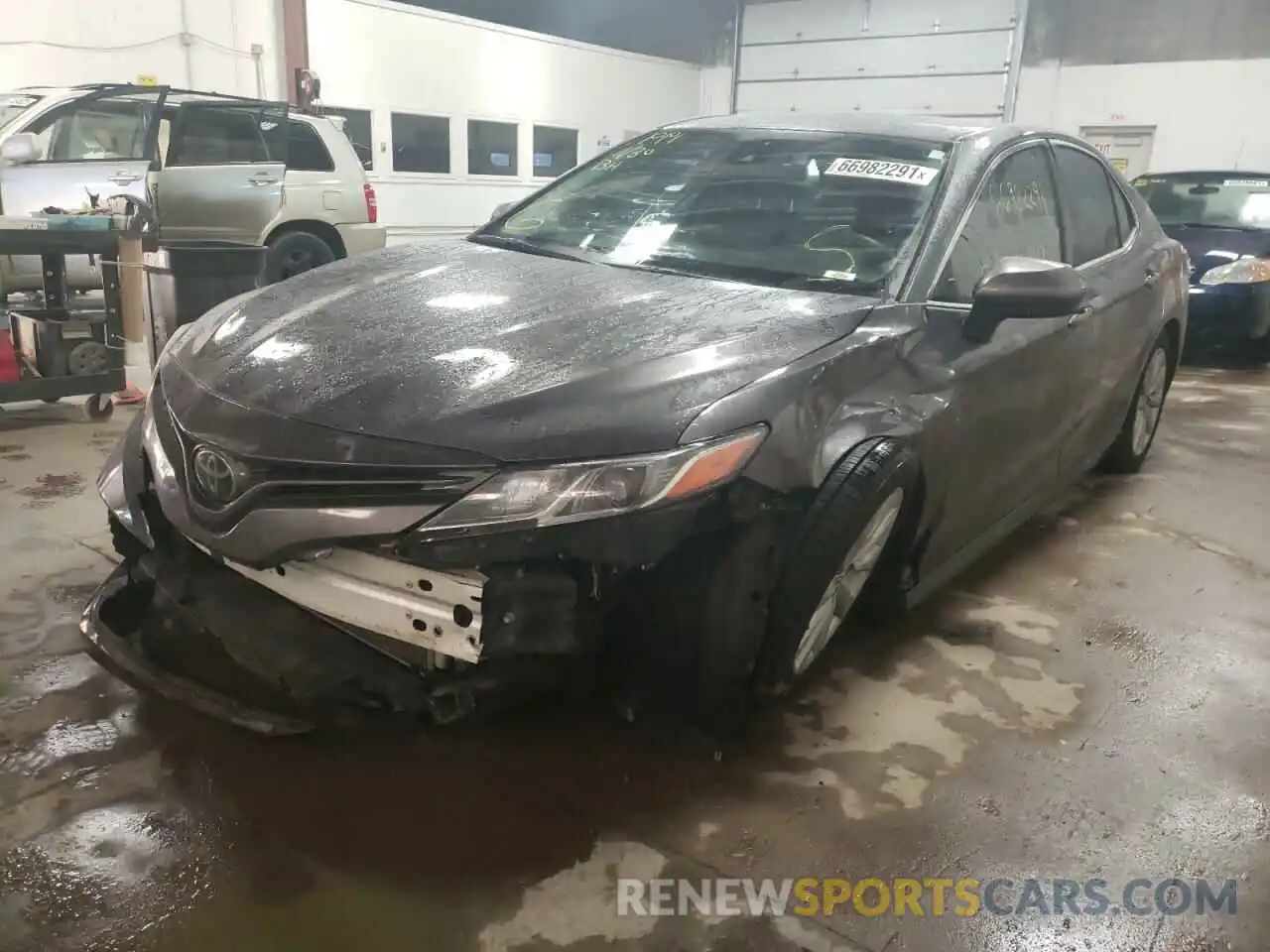 2 Photograph of a damaged car 4T1B11HK4KU830229 TOYOTA CAMRY 2019