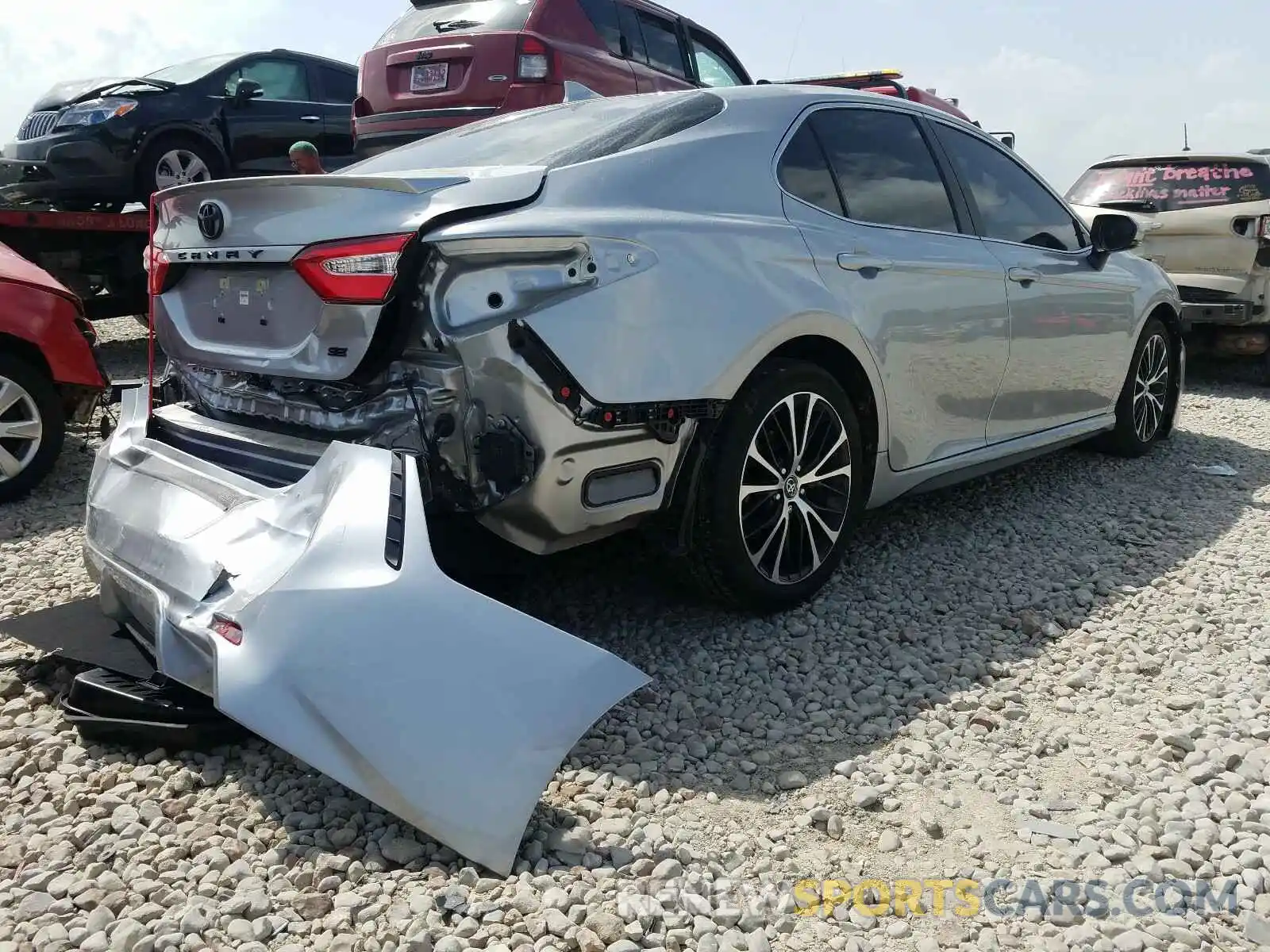 4 Photograph of a damaged car 4T1B11HK4KU830599 TOYOTA CAMRY 2019