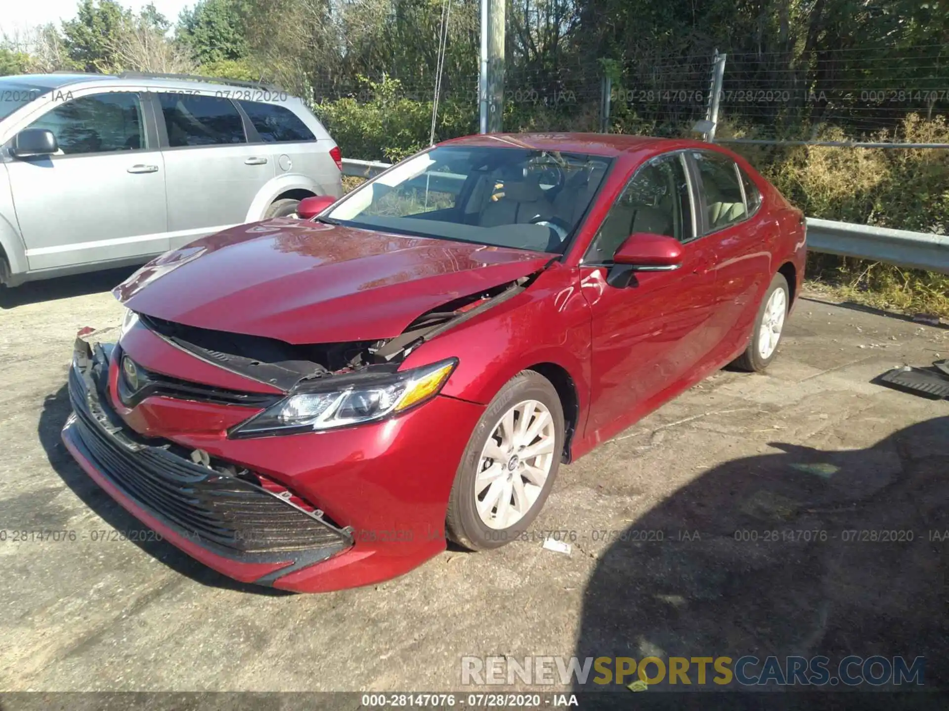 2 Photograph of a damaged car 4T1B11HK4KU831557 TOYOTA CAMRY 2019