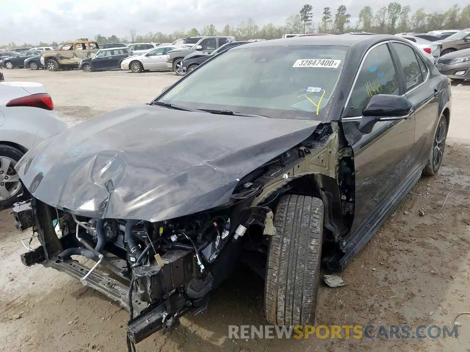 2 Photograph of a damaged car 4T1B11HK4KU831848 TOYOTA CAMRY 2019