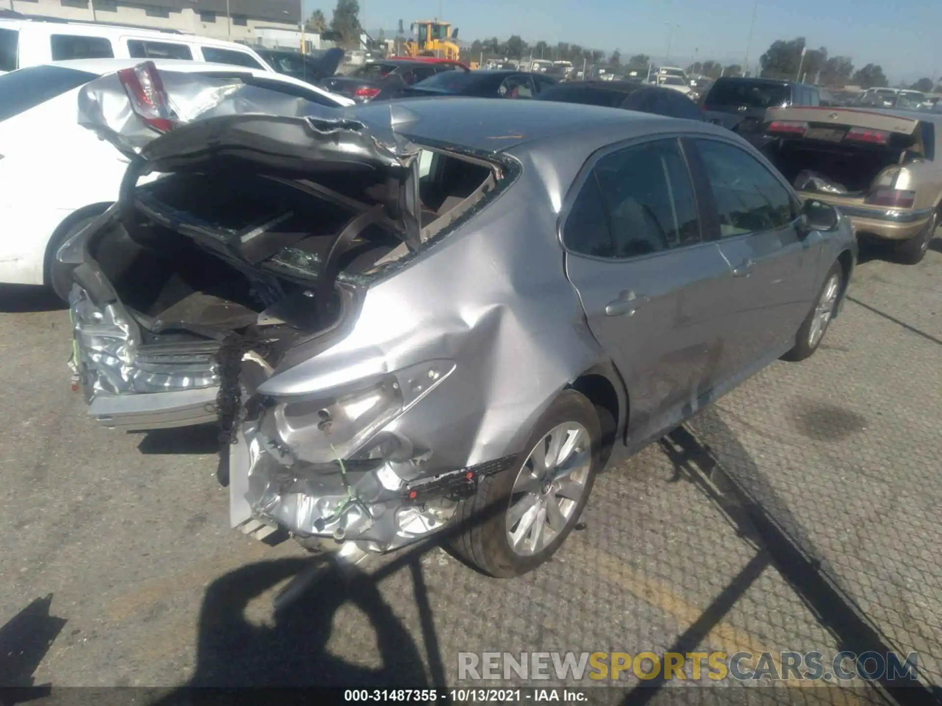 4 Photograph of a damaged car 4T1B11HK4KU833292 TOYOTA CAMRY 2019