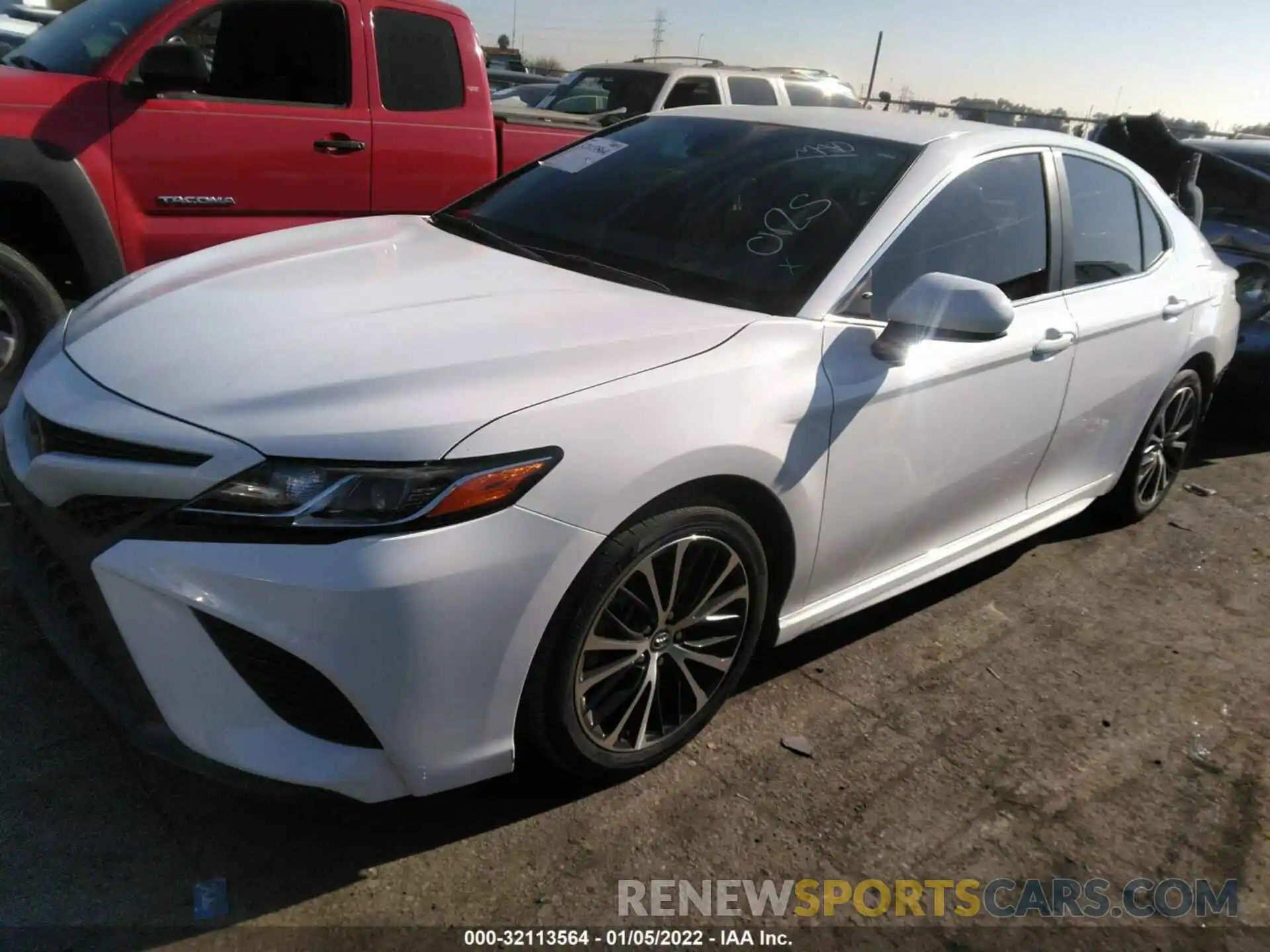 2 Photograph of a damaged car 4T1B11HK4KU837603 TOYOTA CAMRY 2019