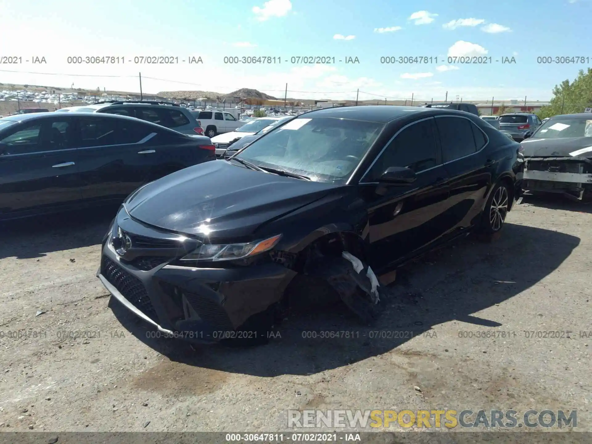 2 Photograph of a damaged car 4T1B11HK4KU842297 TOYOTA CAMRY 2019