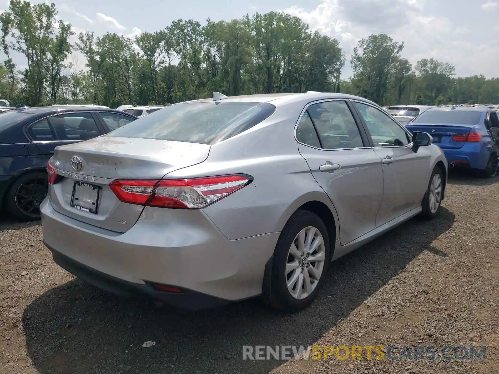 4 Photograph of a damaged car 4T1B11HK4KU844423 TOYOTA CAMRY 2019