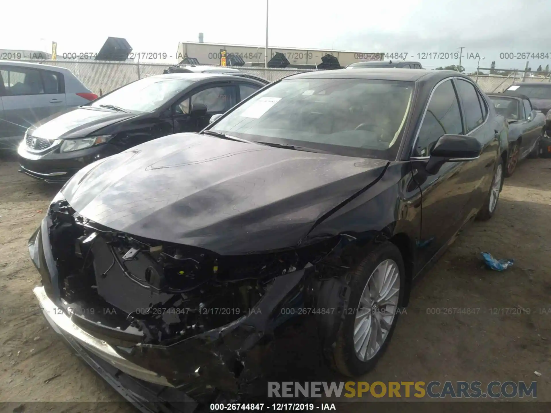 2 Photograph of a damaged car 4T1B11HK4KU847368 TOYOTA CAMRY 2019