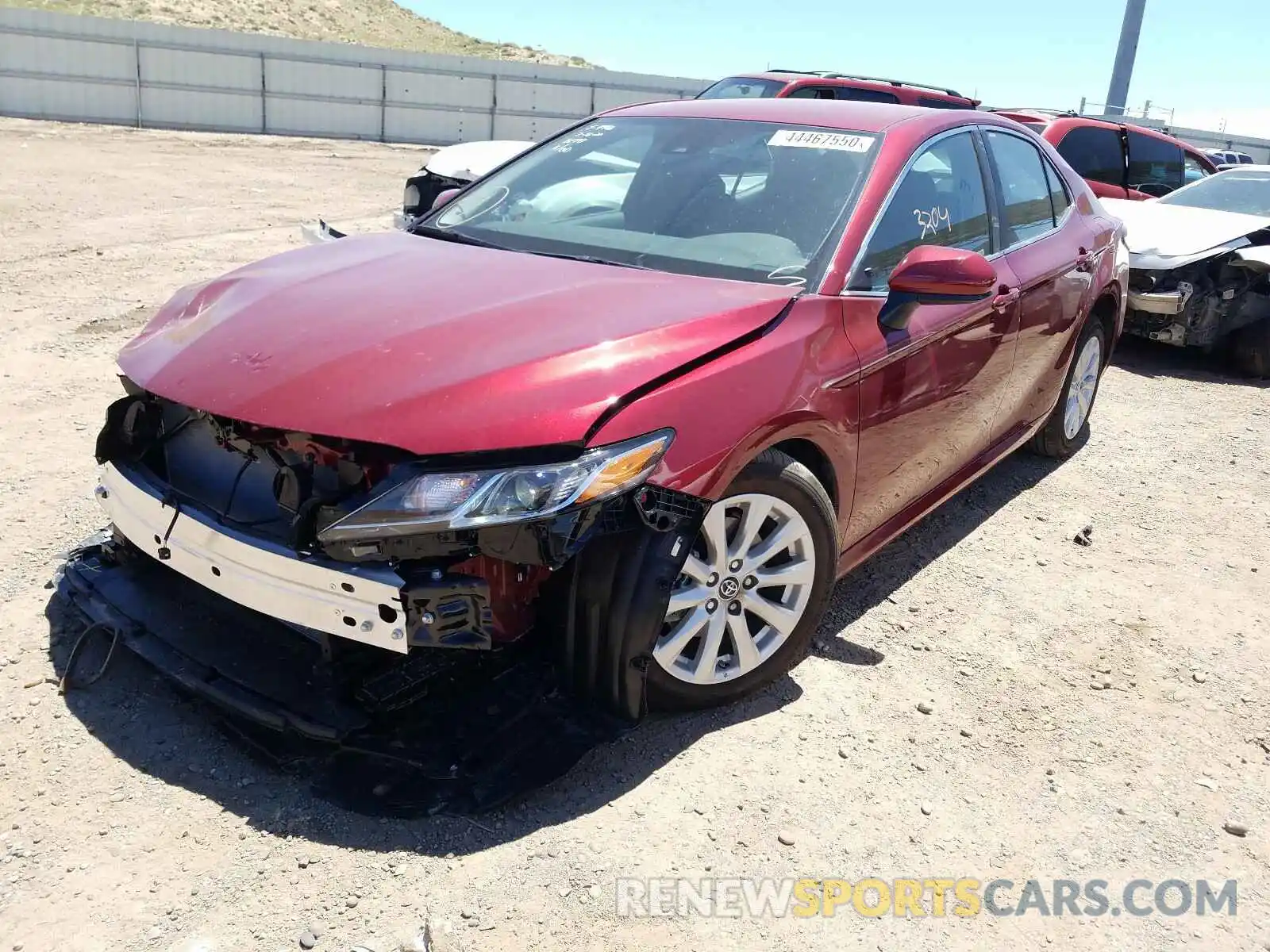 2 Photograph of a damaged car 4T1B11HK4KU850688 TOYOTA CAMRY 2019