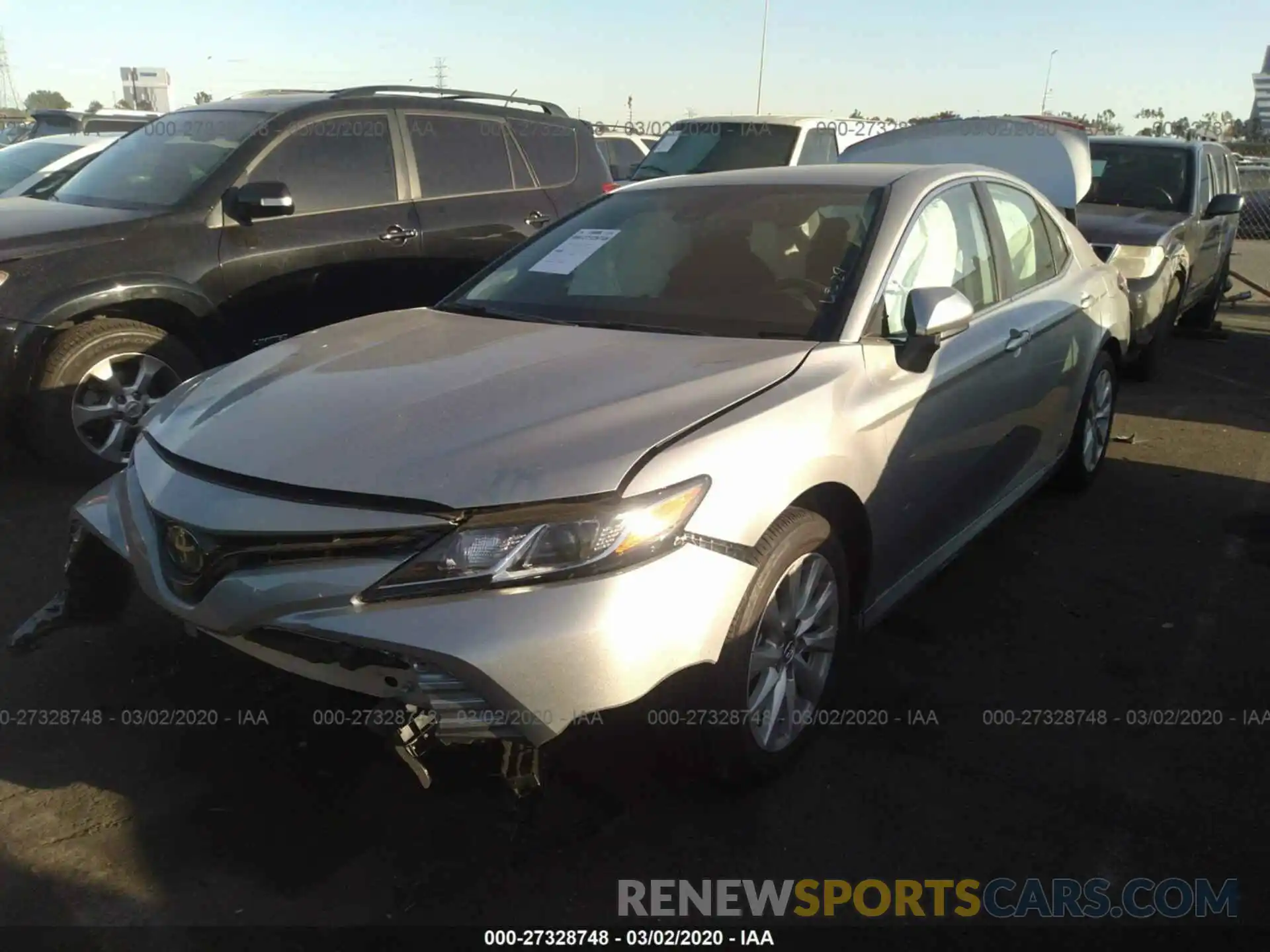 2 Photograph of a damaged car 4T1B11HK4KU852103 TOYOTA CAMRY 2019