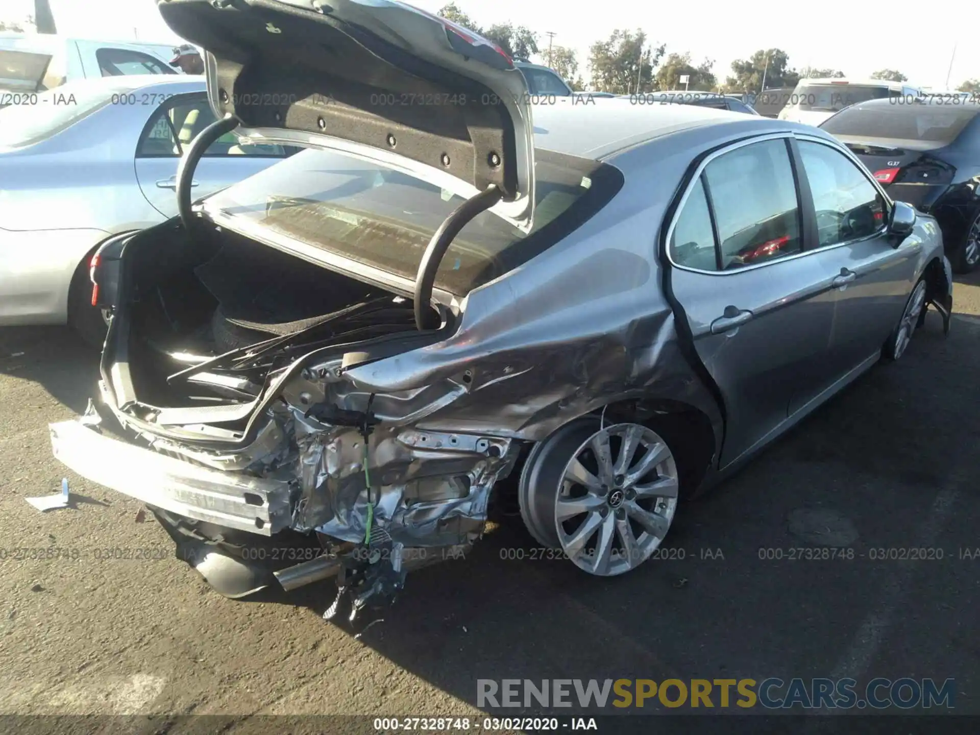 4 Photograph of a damaged car 4T1B11HK4KU852103 TOYOTA CAMRY 2019