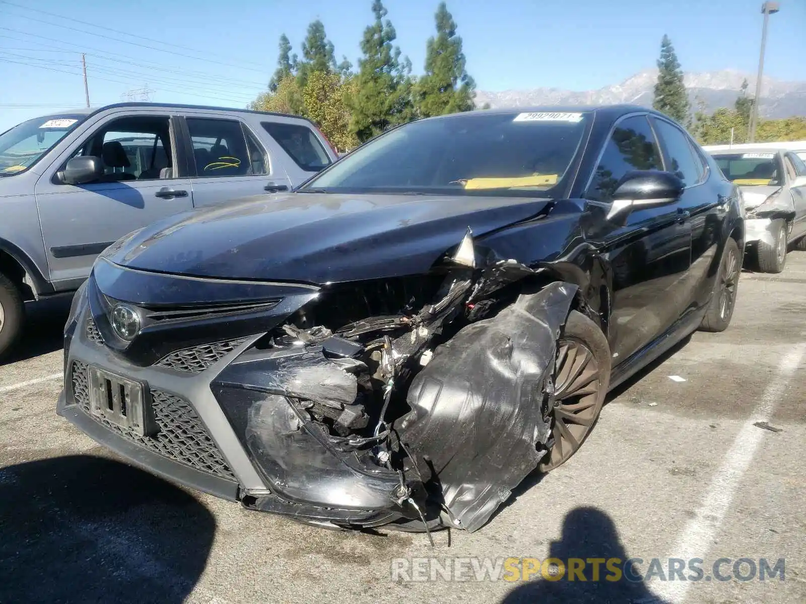 2 Photograph of a damaged car 4T1B11HK4KU856569 TOYOTA CAMRY 2019