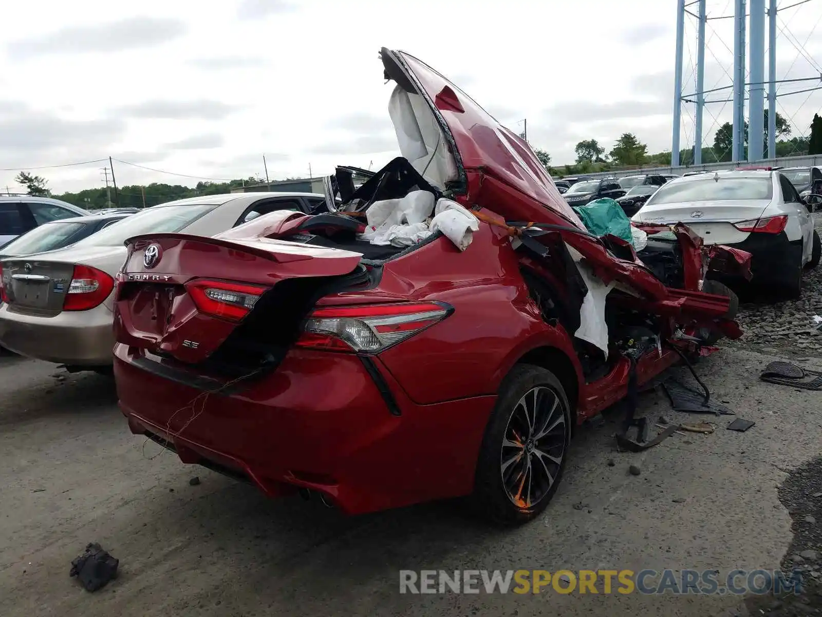 4 Photograph of a damaged car 4T1B11HK5KU164496 TOYOTA CAMRY 2019