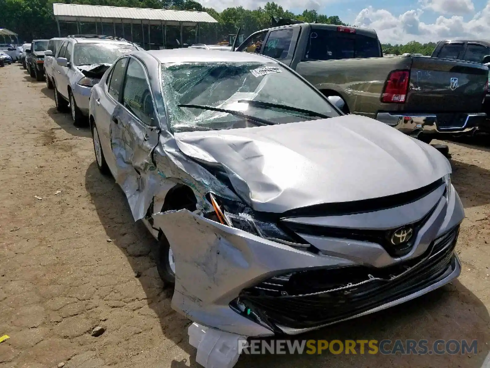 1 Photograph of a damaged car 4T1B11HK5KU171951 TOYOTA CAMRY 2019