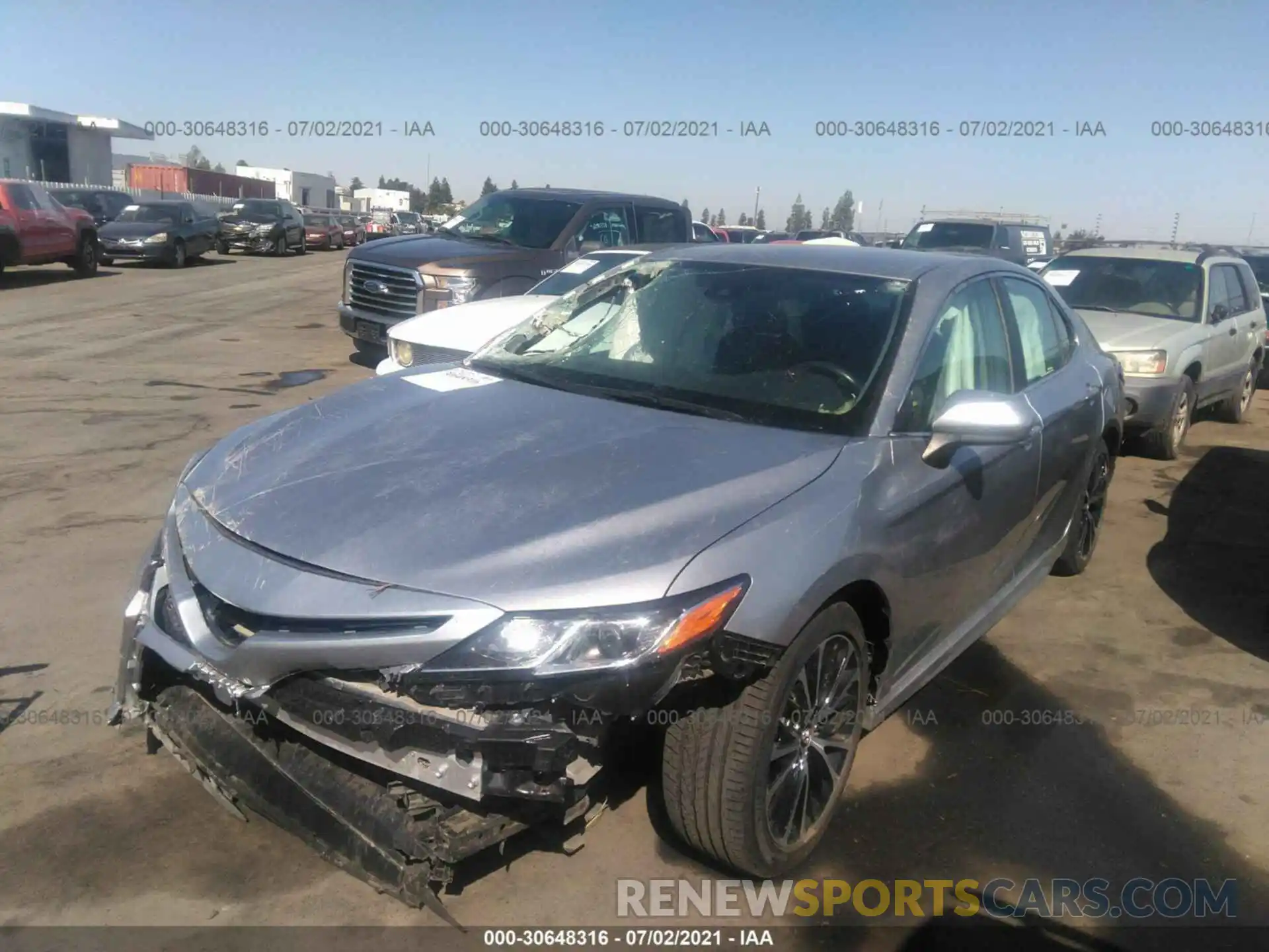 2 Photograph of a damaged car 4T1B11HK5KU173778 TOYOTA CAMRY 2019