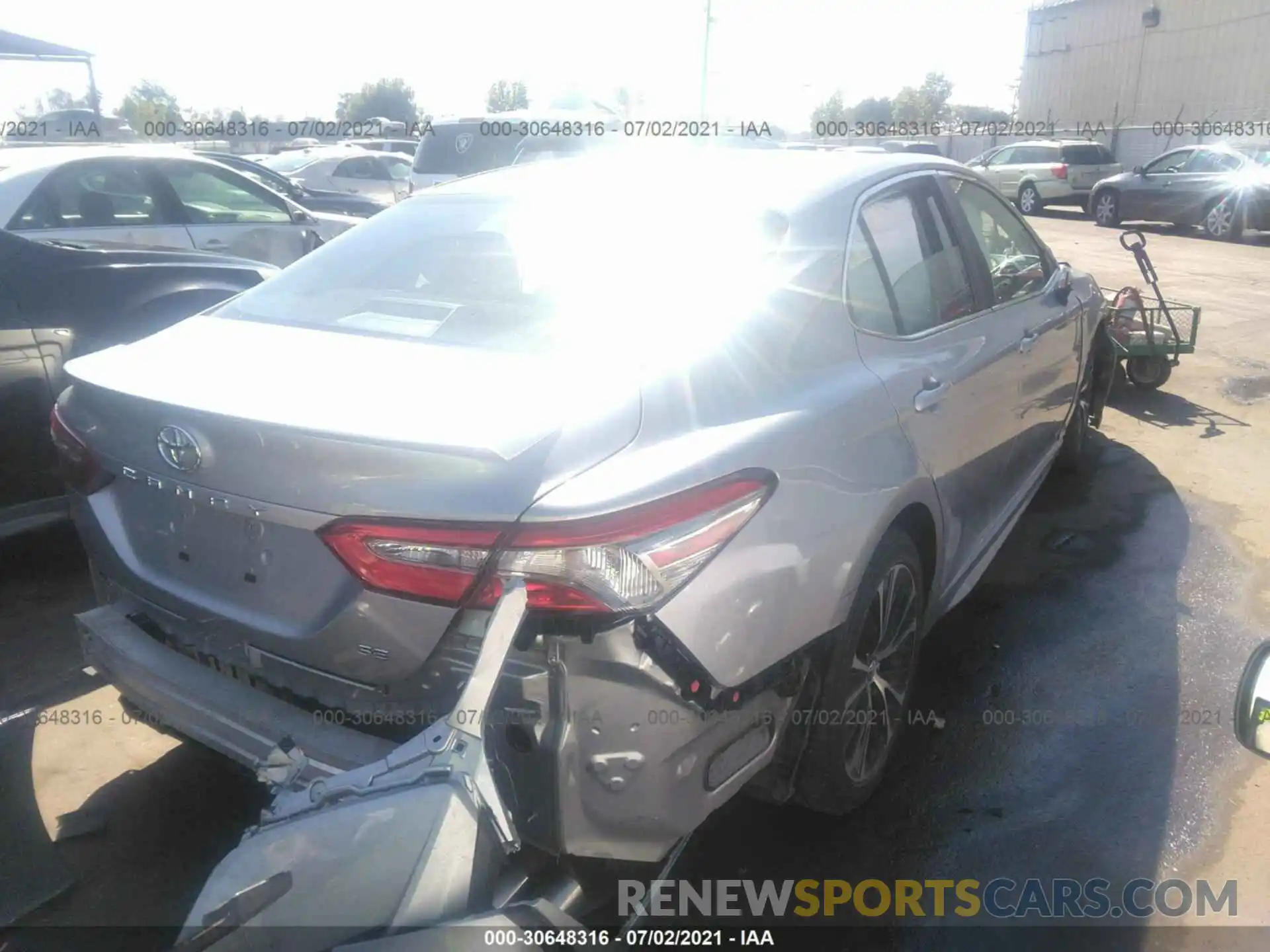 4 Photograph of a damaged car 4T1B11HK5KU173778 TOYOTA CAMRY 2019