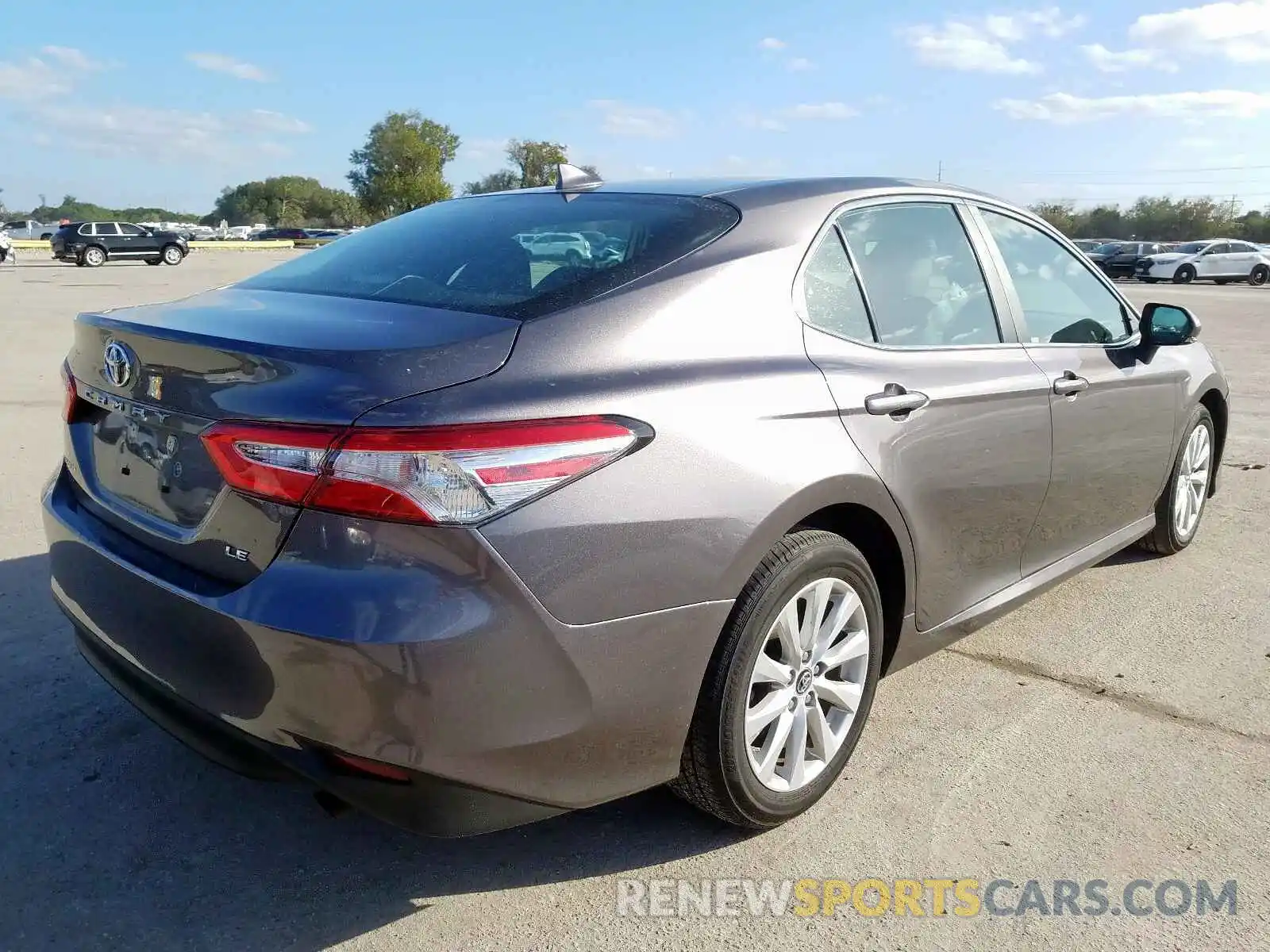 4 Photograph of a damaged car 4T1B11HK5KU175983 TOYOTA CAMRY 2019