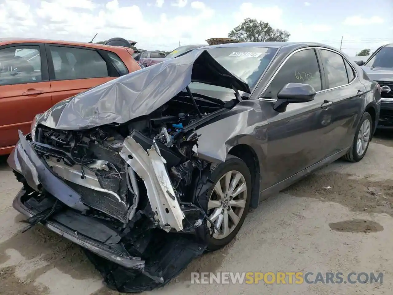 2 Photograph of a damaged car 4T1B11HK5KU184134 TOYOTA CAMRY 2019