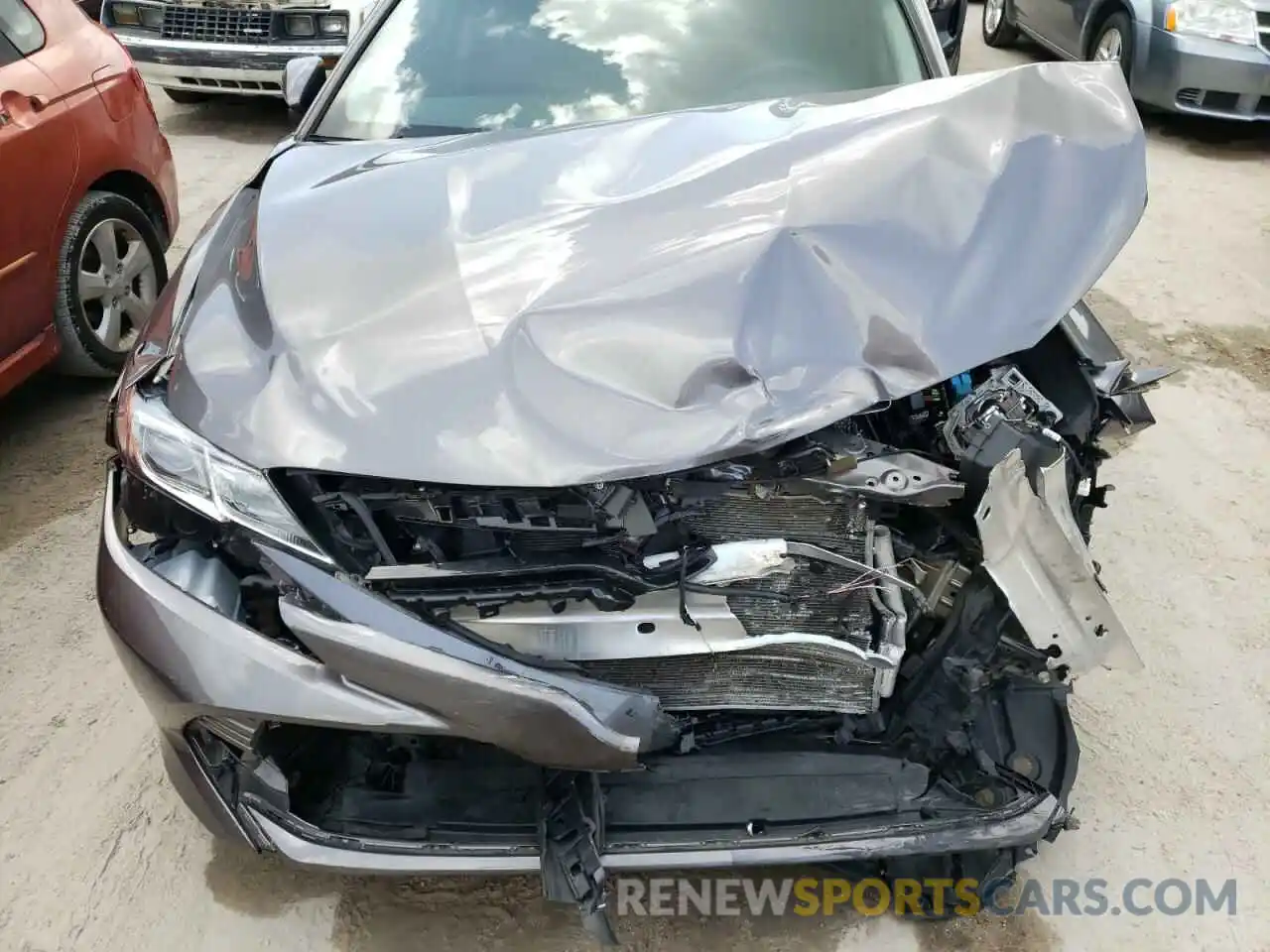 7 Photograph of a damaged car 4T1B11HK5KU184134 TOYOTA CAMRY 2019