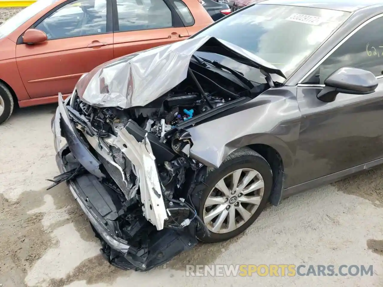 9 Photograph of a damaged car 4T1B11HK5KU184134 TOYOTA CAMRY 2019