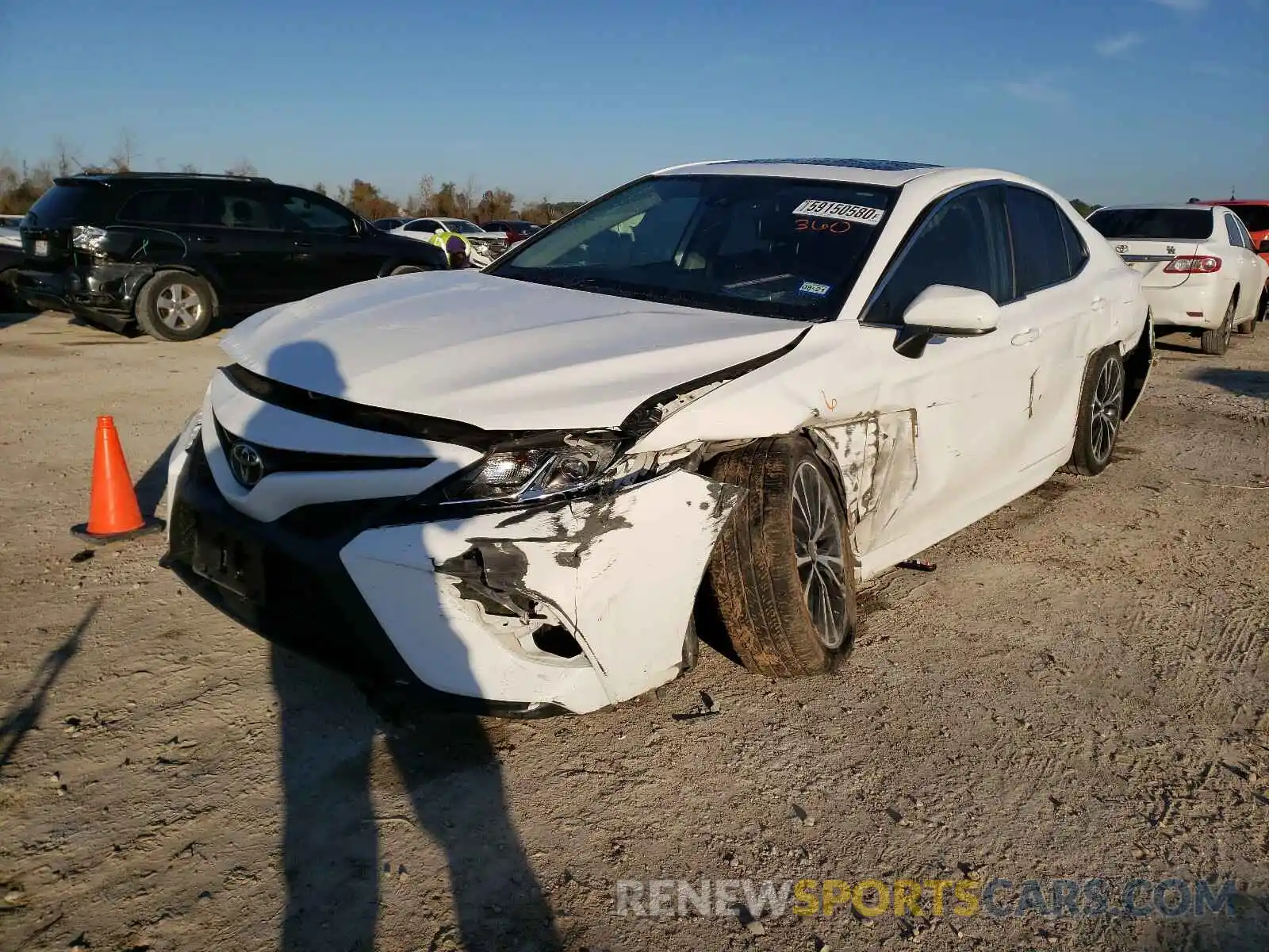 2 Photograph of a damaged car 4T1B11HK5KU194100 TOYOTA CAMRY 2019