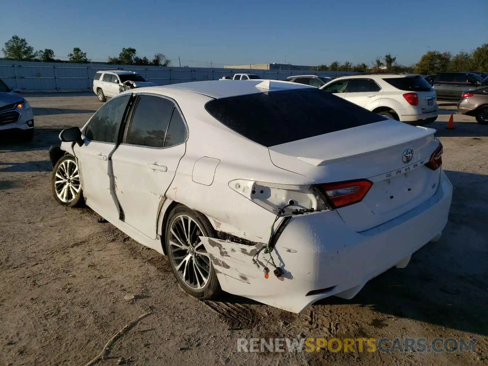 3 Photograph of a damaged car 4T1B11HK5KU194100 TOYOTA CAMRY 2019