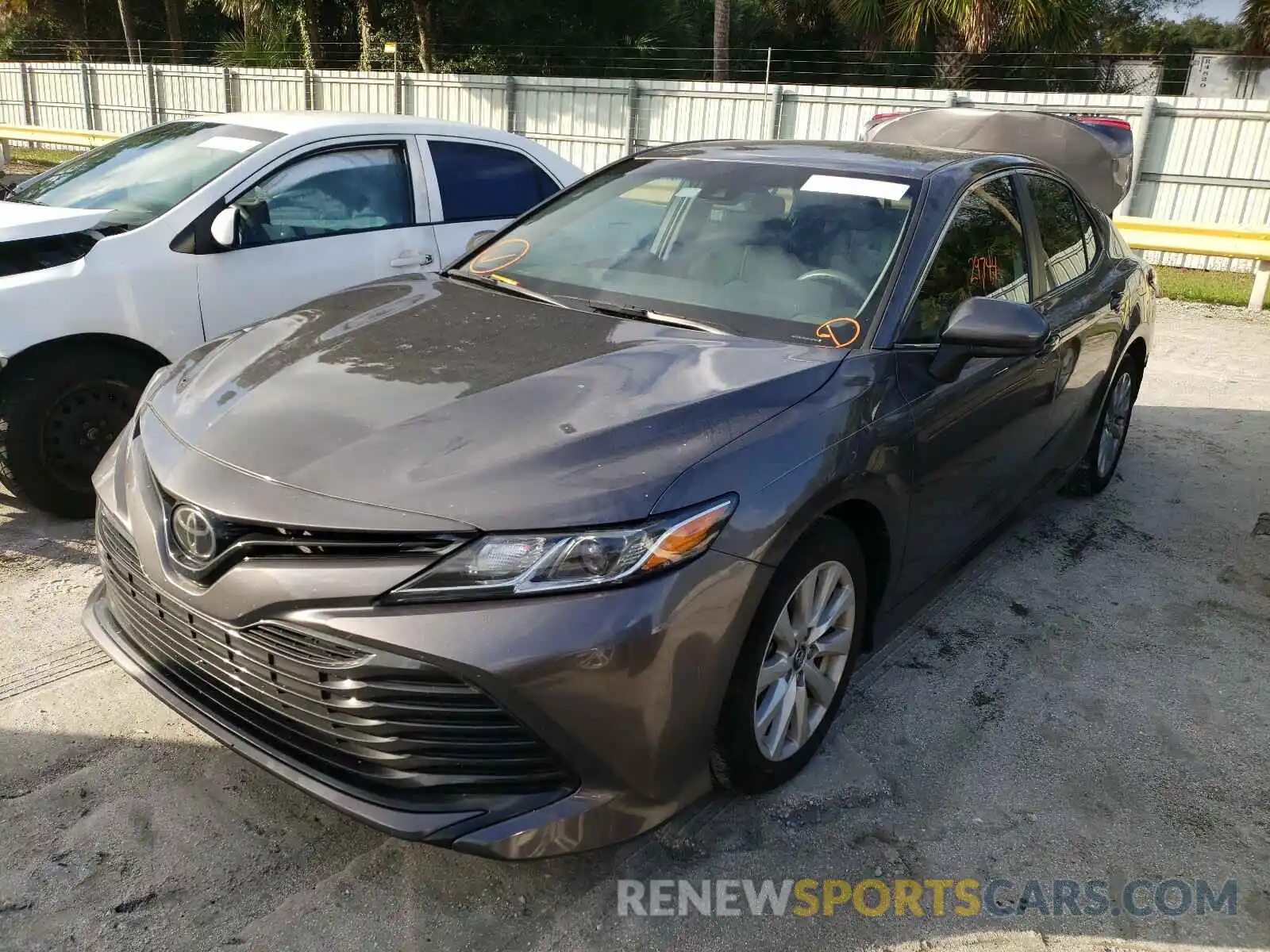 2 Photograph of a damaged car 4T1B11HK5KU194243 TOYOTA CAMRY 2019