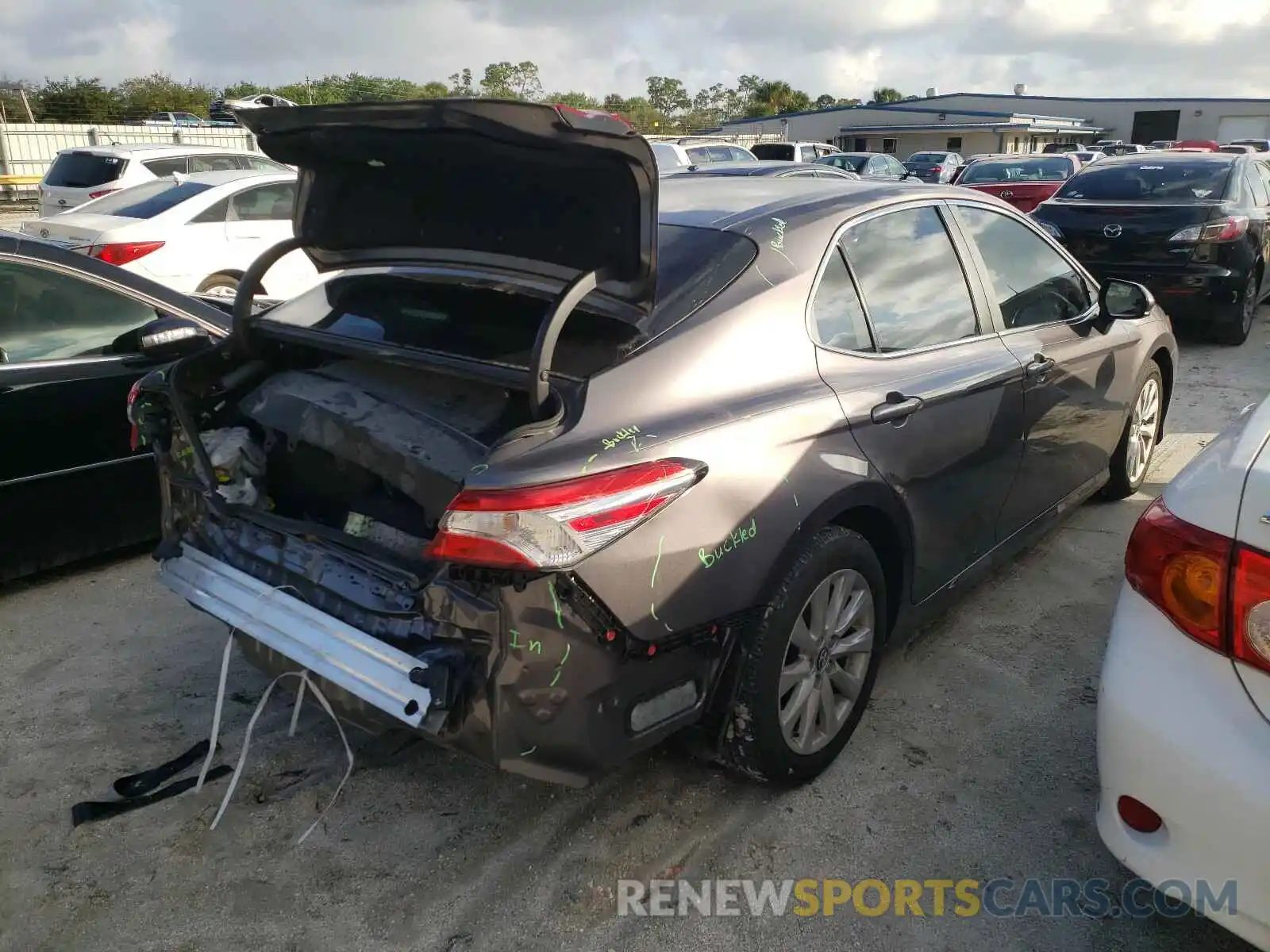 4 Photograph of a damaged car 4T1B11HK5KU194243 TOYOTA CAMRY 2019