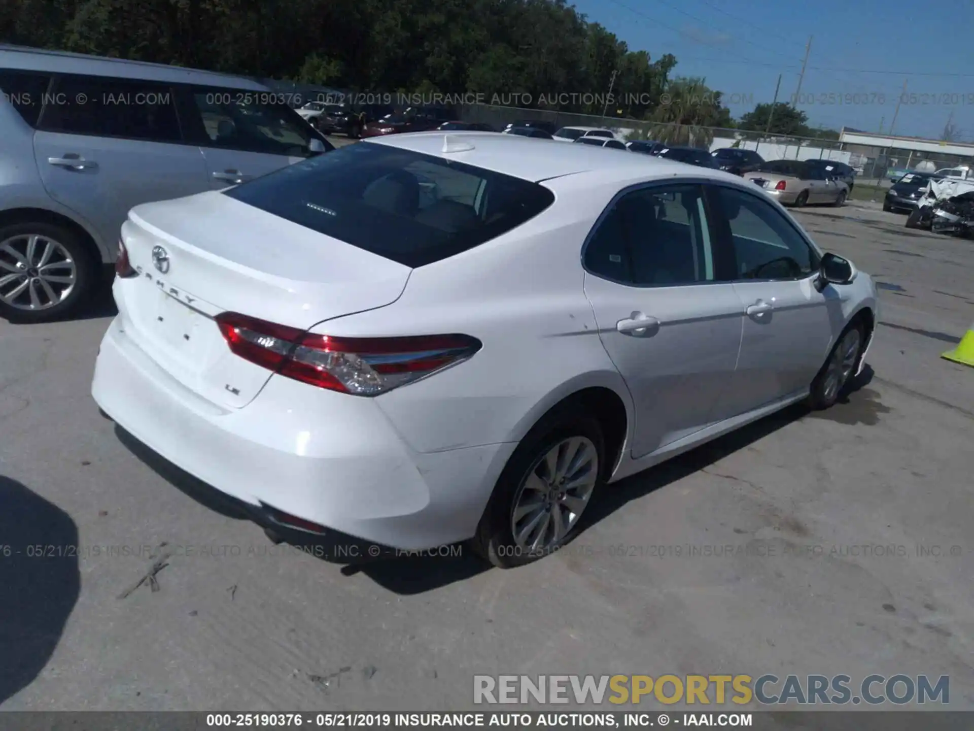 4 Photograph of a damaged car 4T1B11HK5KU195120 TOYOTA CAMRY 2019