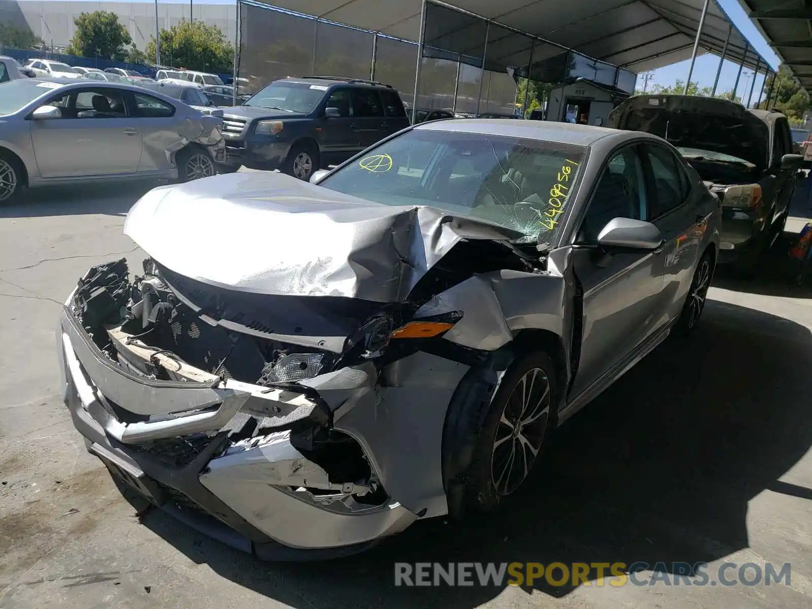 2 Photograph of a damaged car 4T1B11HK5KU195621 TOYOTA CAMRY 2019